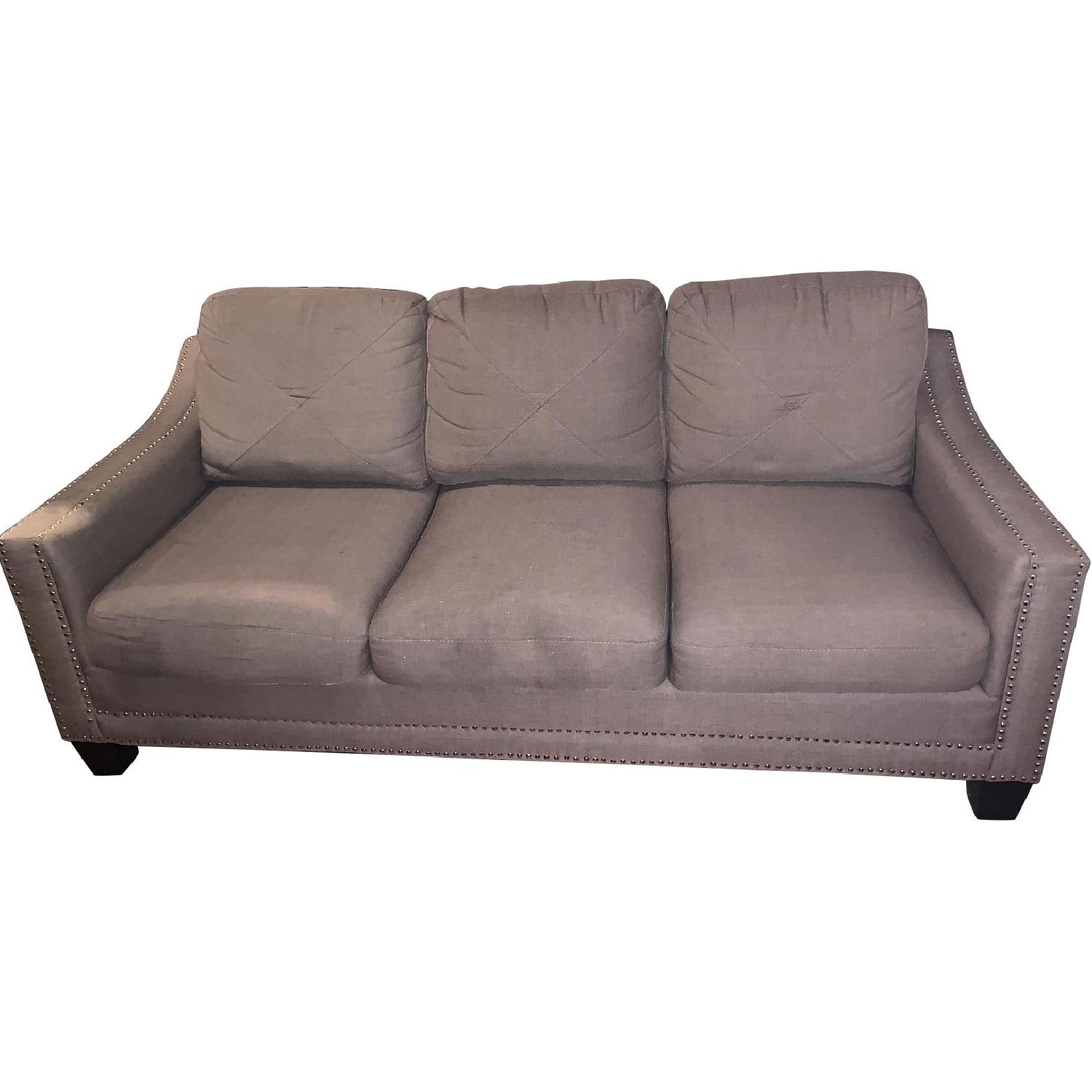 Bob's Beige Studded Sofa - image-0