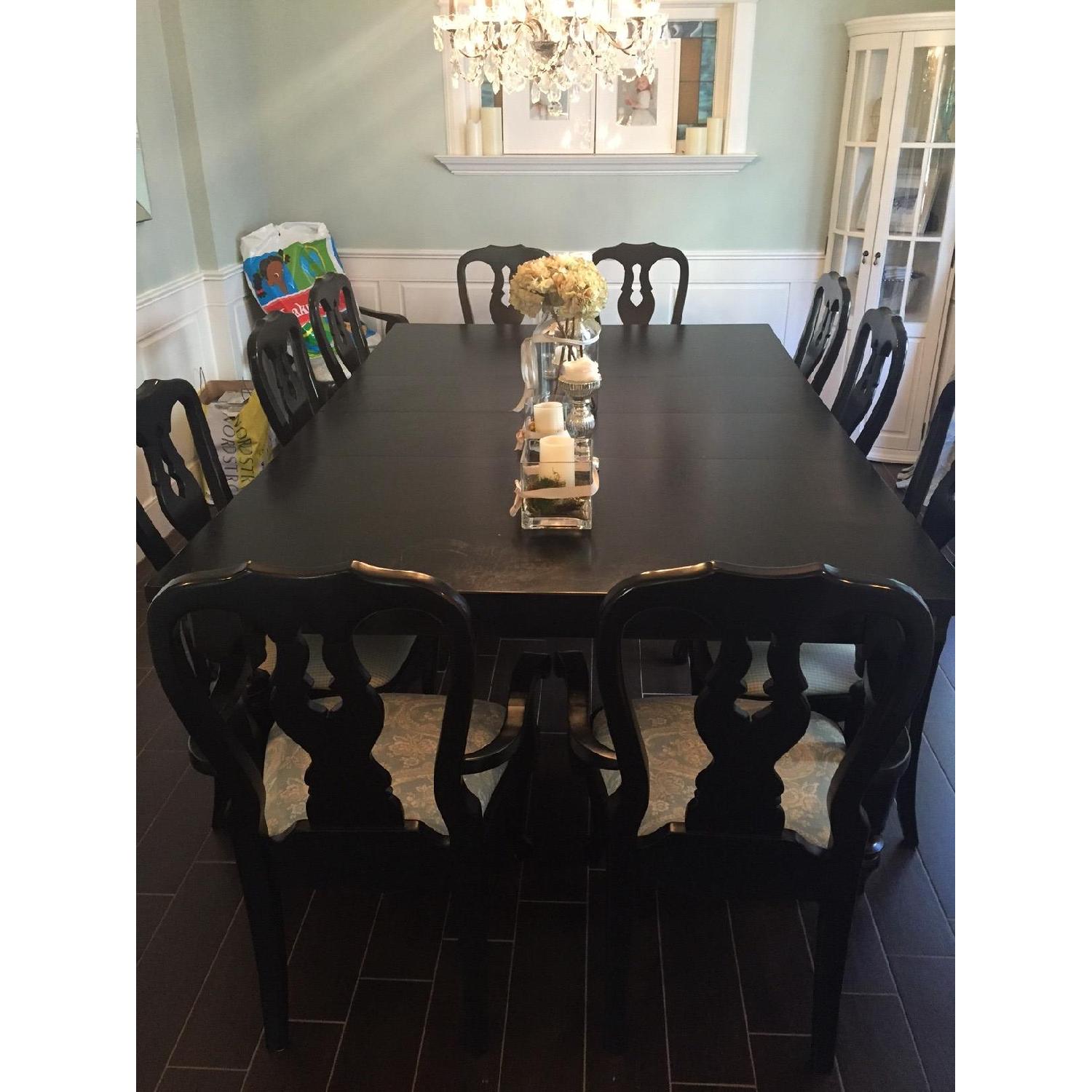 Pottery Barn Oversized Black Dining Table w/ 12 Chairs AptDeco