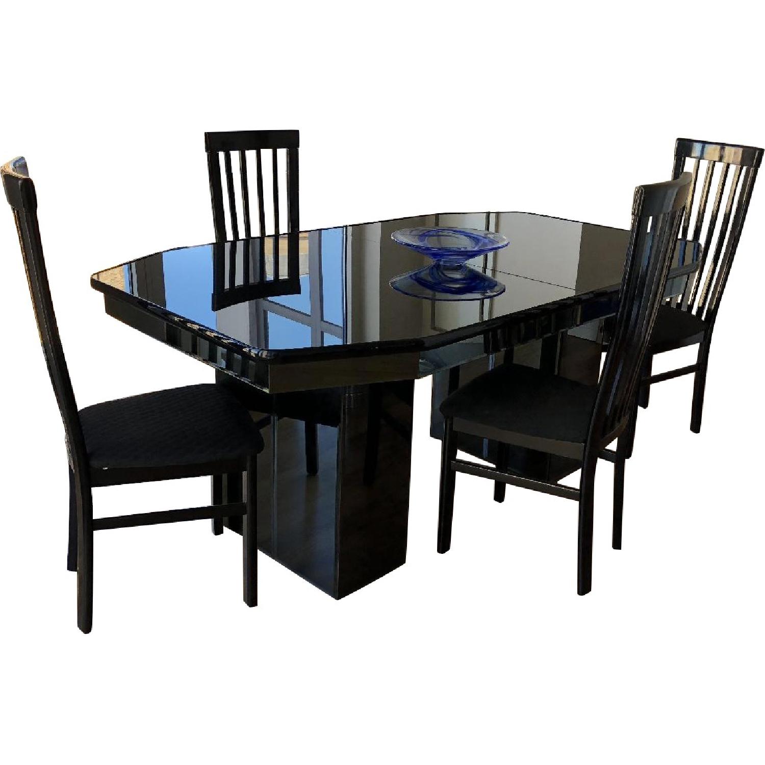 Black Glass Top Expandable Dining Table w/ 4 Chairs - AptDeco