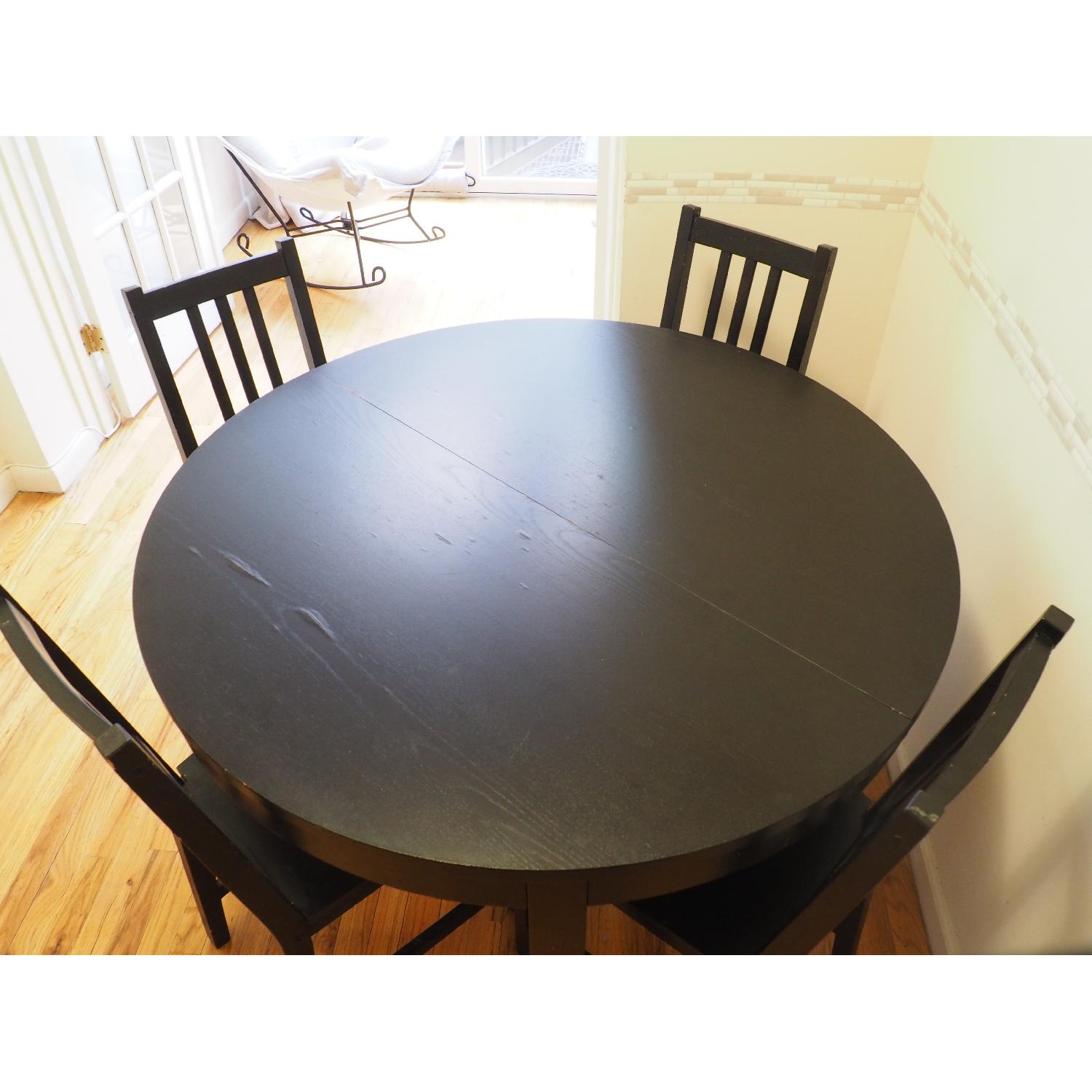 Ikea Bjursta Brown-Black Extendable Table w/ 4 Stefan Chairs - AptDeco