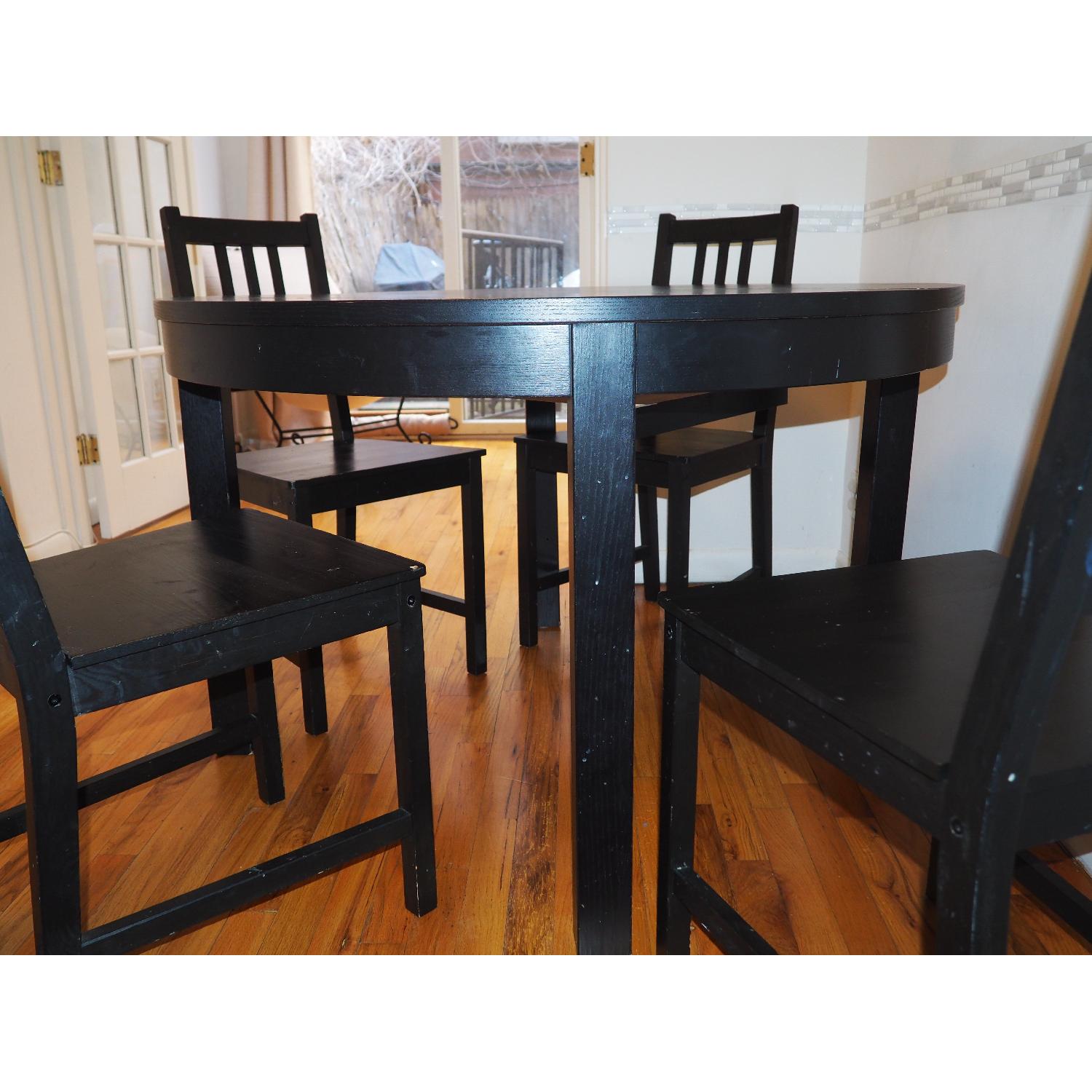 Ikea Bjursta Brown-Black Extendable Table w/ 4 Stefan Chairs - AptDeco