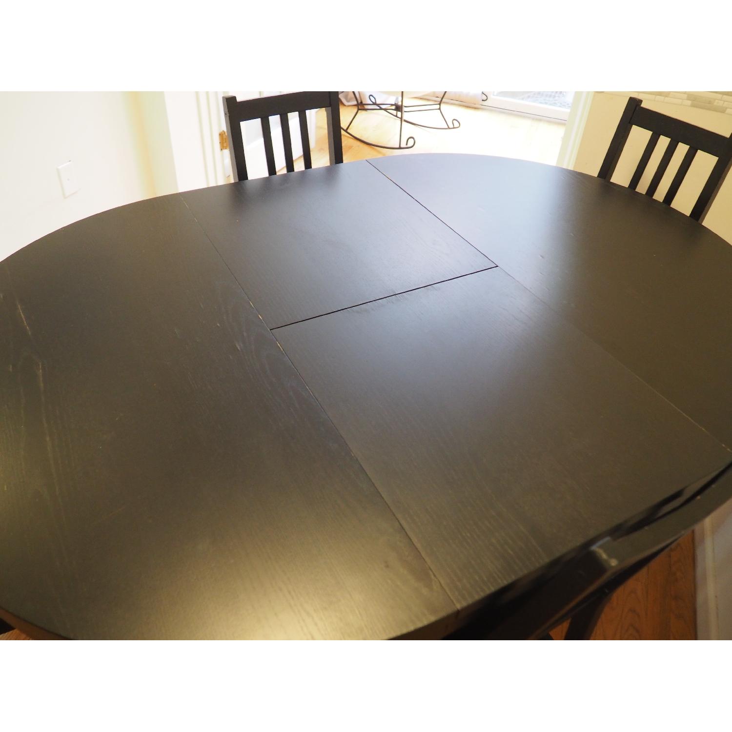 Ikea Bjursta Brown-Black Extendable Table w/ 4 Stefan Chairs - AptDeco