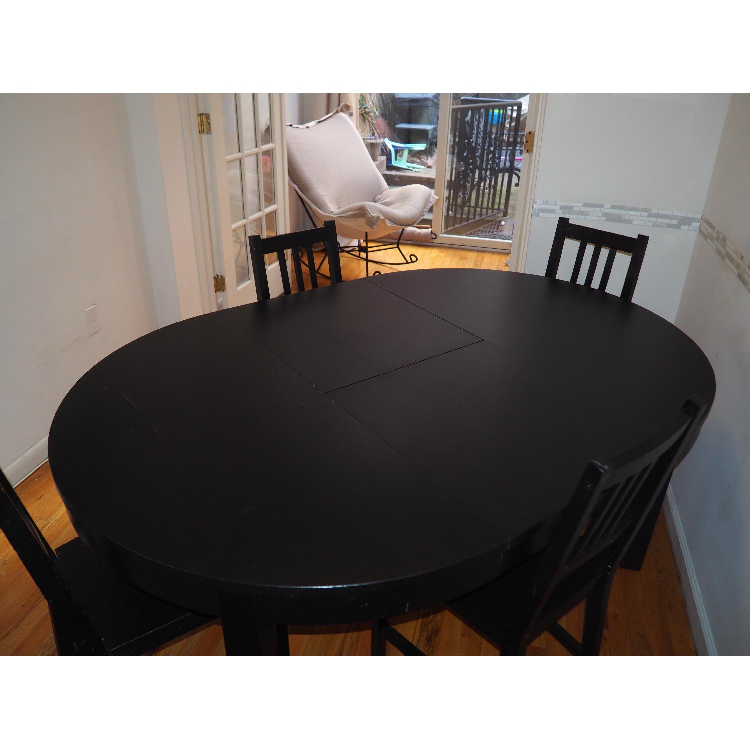 Ikea Bjursta Brown-Black Extendable Table w/ 4 Stefan Chairs - AptDeco
