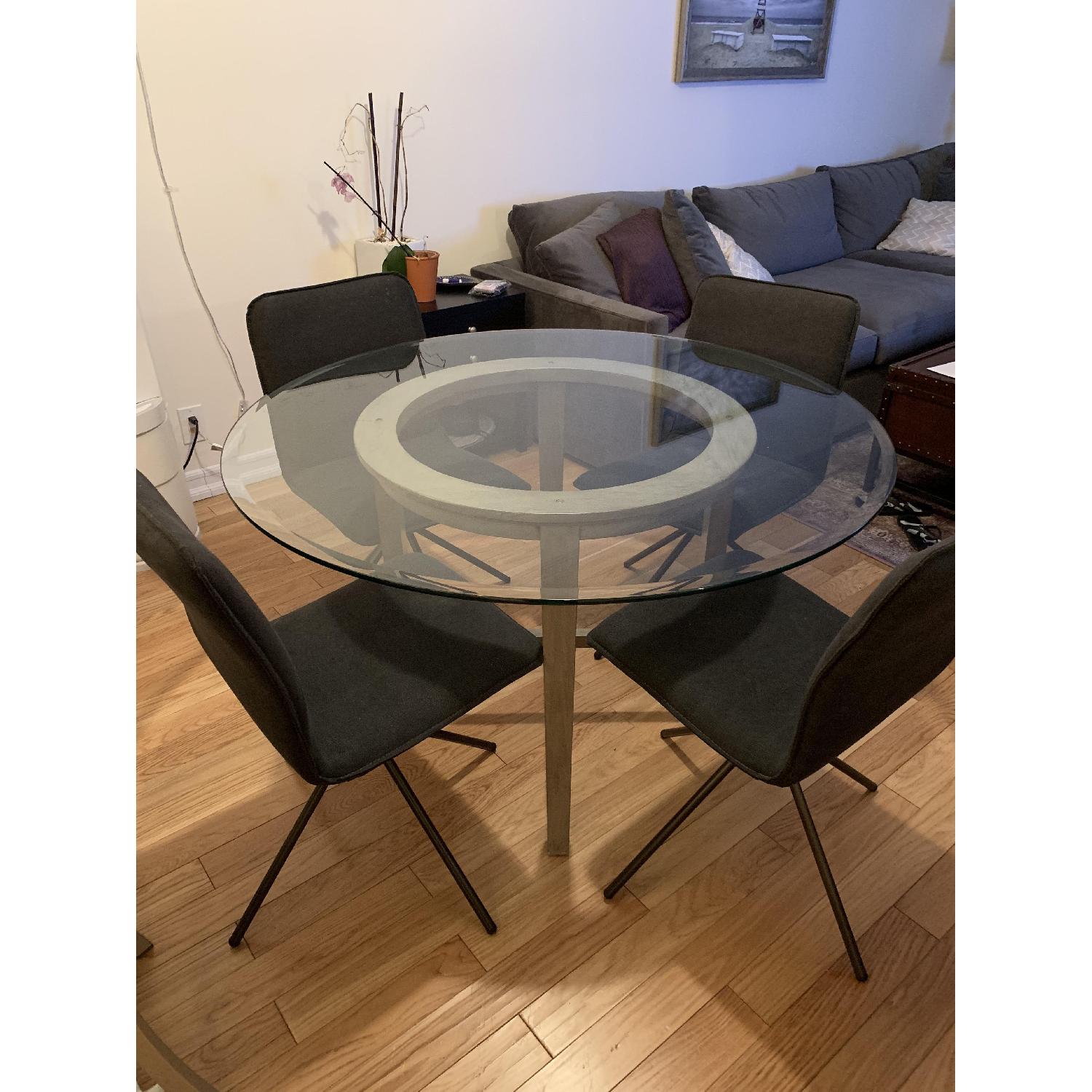 Crate & Barrel Glass Top Round Dining Table - image-1