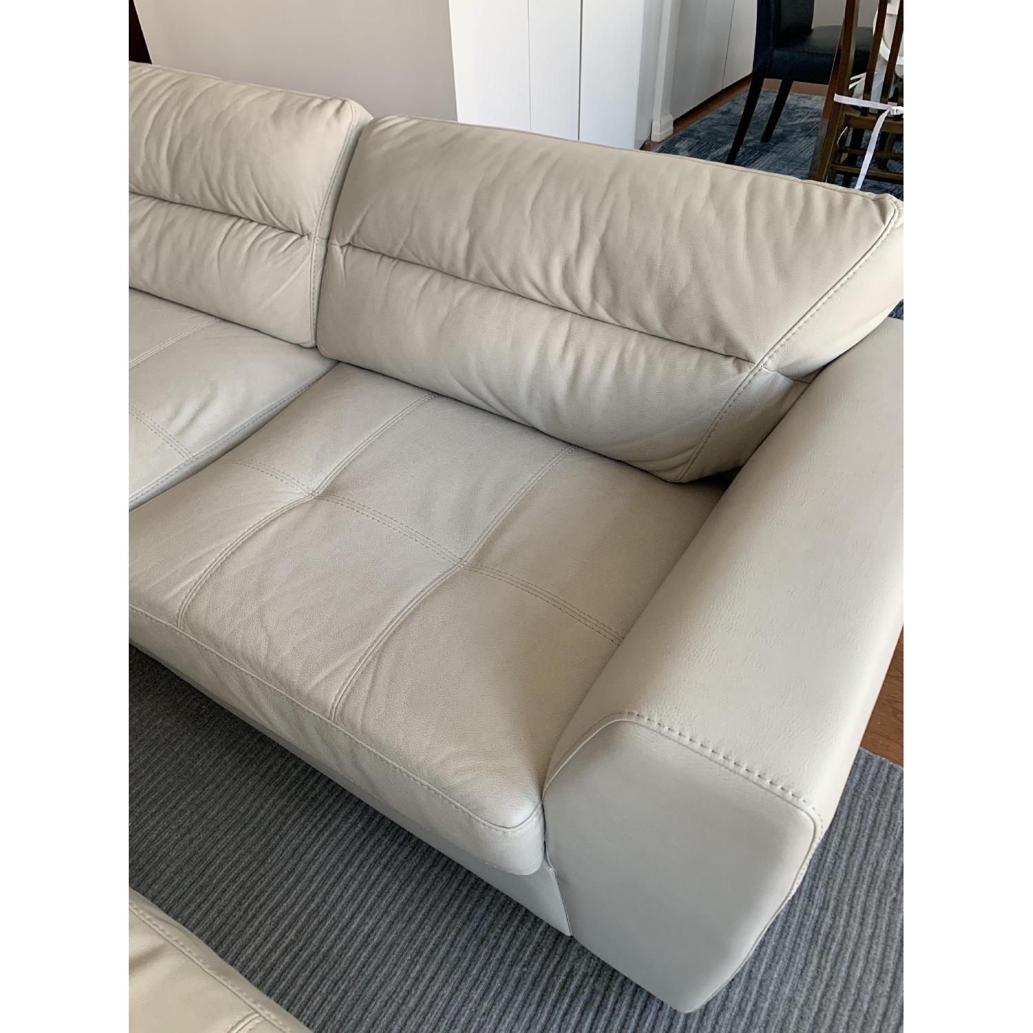 Rooms To Go Off White Faux Leather Sectional Sofa Ottoman Aptdeco