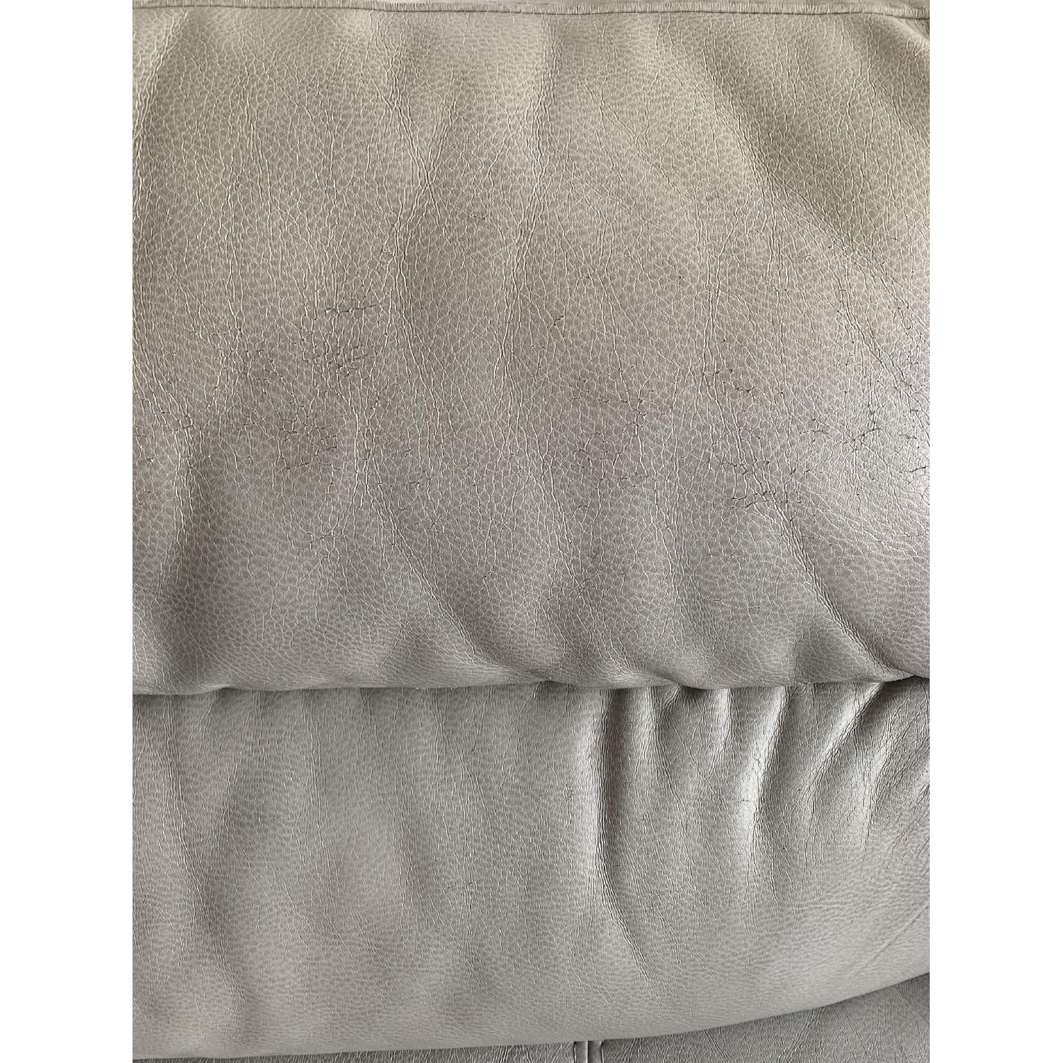 Rooms To Go Off White Faux Leather Sectional Sofa & Ottoman - image-5