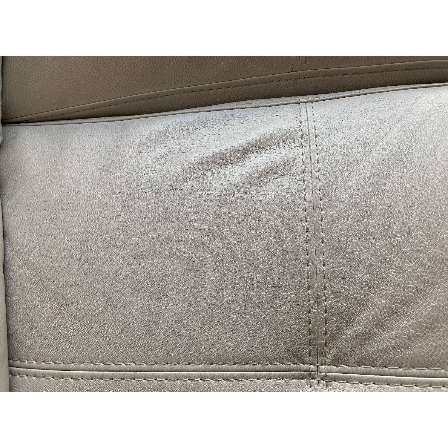 Rooms To Go Off White Faux Leather Sectional Sofa & Ottoman - image-6