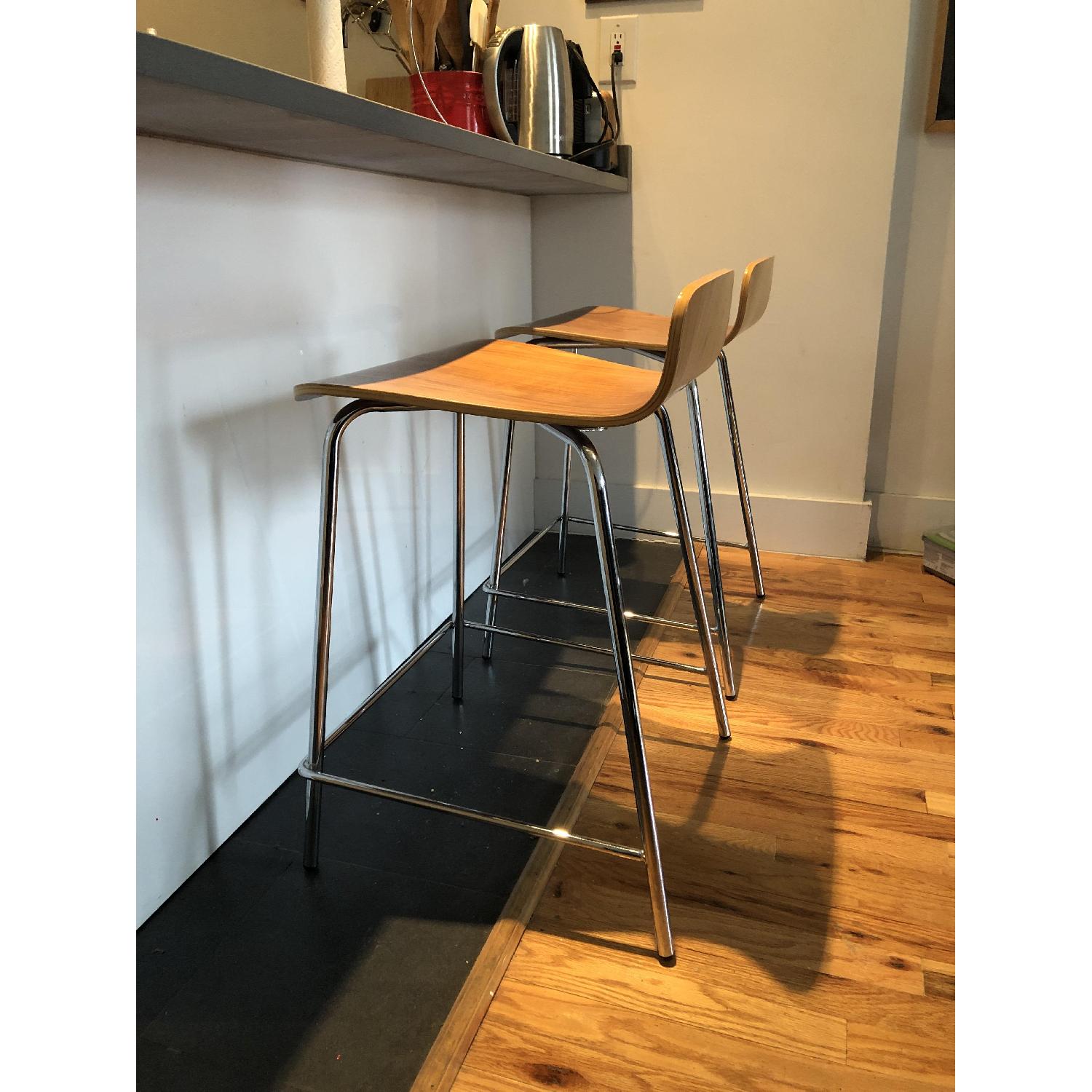 Crate & Barrel Felix Walnut Counter Stools - image-1