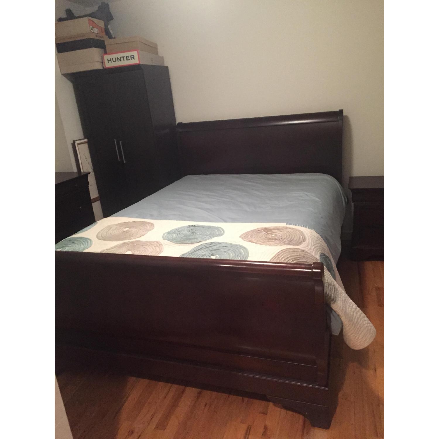 Macy's Solid Wood Dark Brown Queen Sleigh Bed Frame - AptDeco