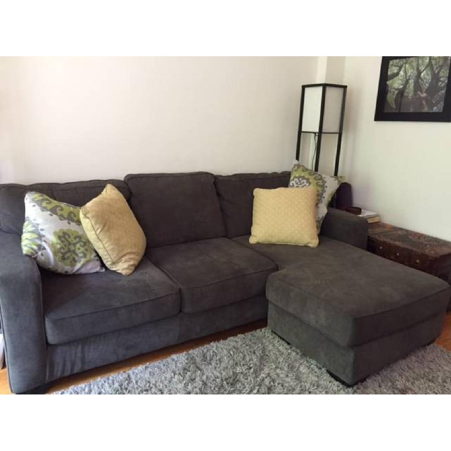 Jennifer Convertibles Dark Grey Sectional Sofa AptDeco