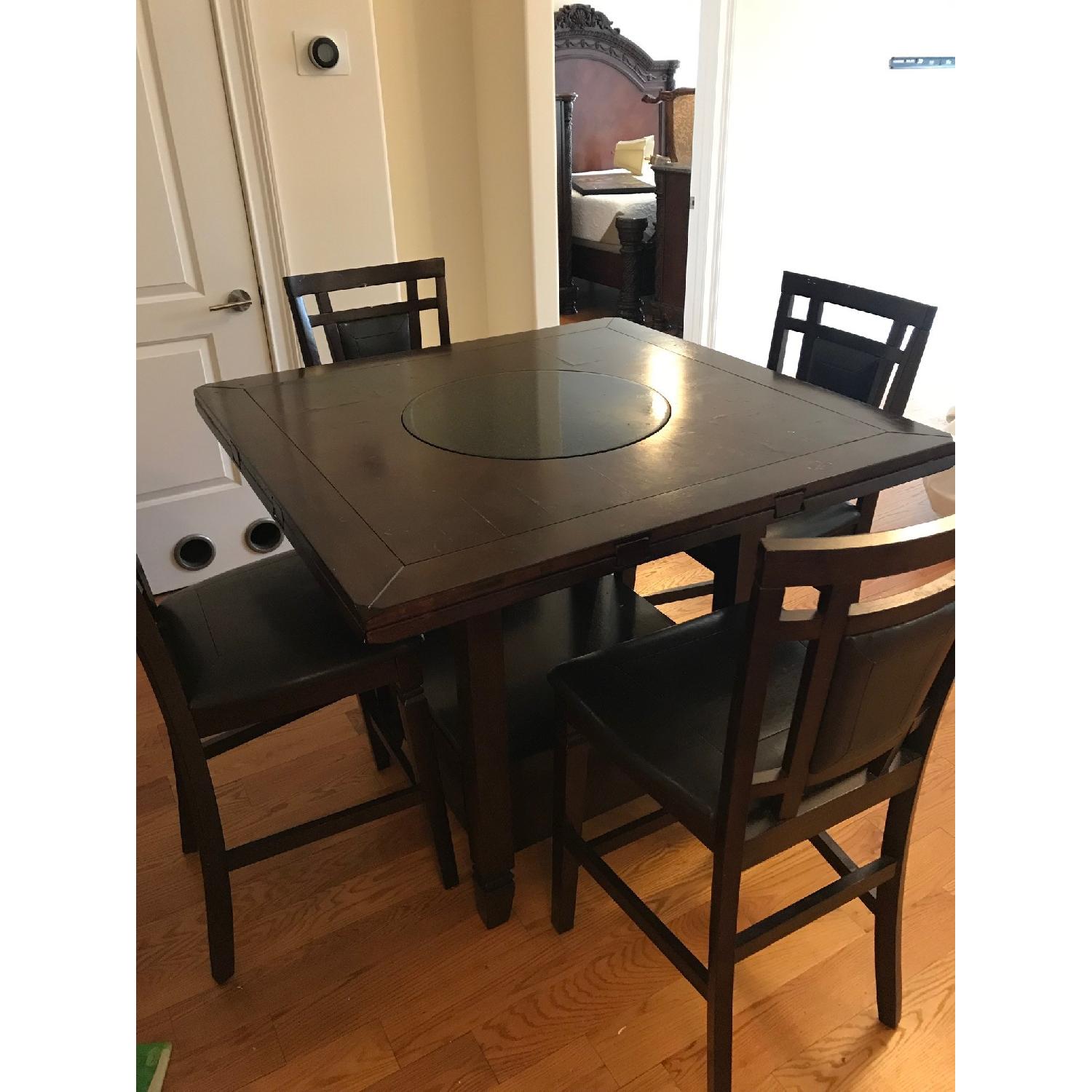 Raymour & Flanigan Dining Table w/ Lazy Susan & 4 Stools - image-1