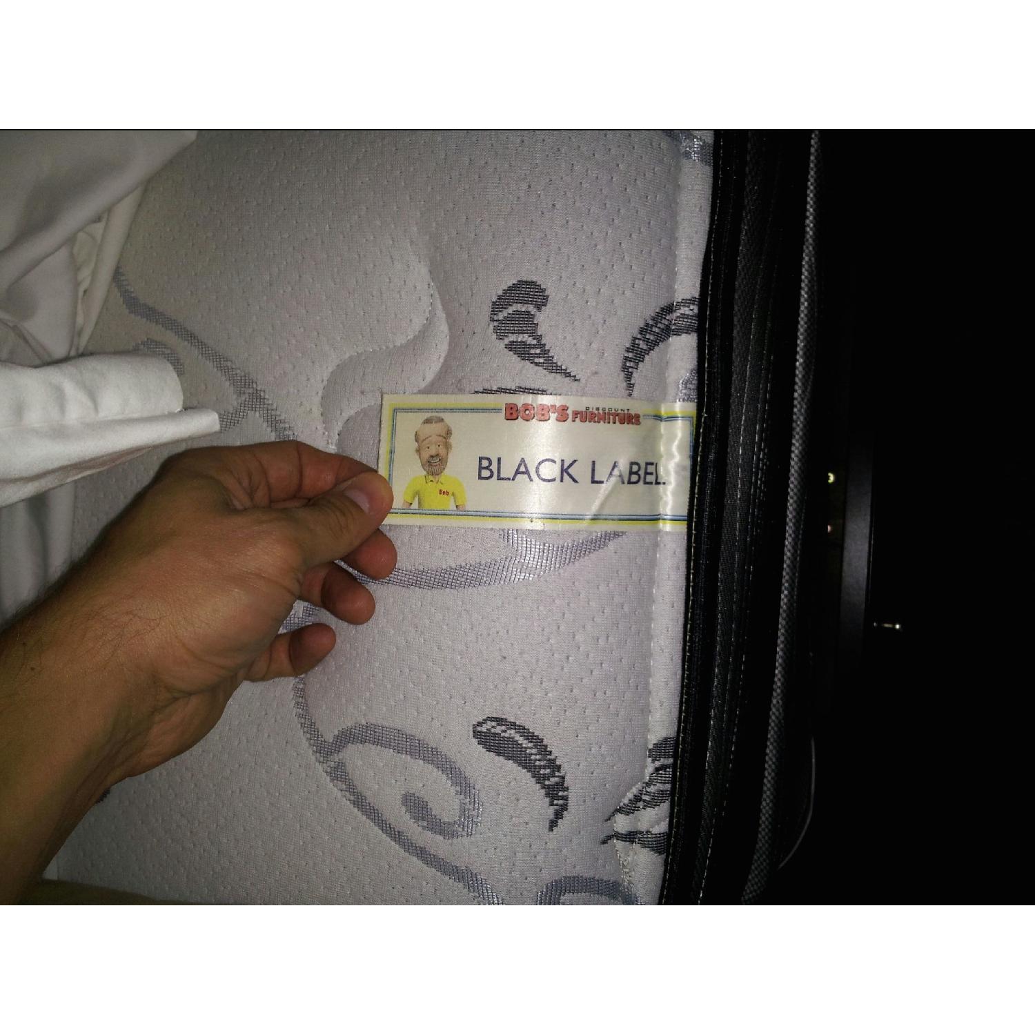 Bob's Furniture King Size Wooden Bed Frame - image-1