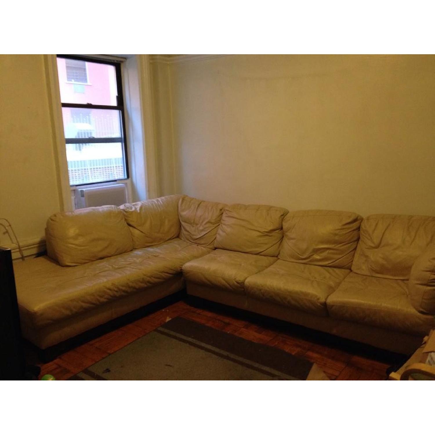 Haverty's White Leather Sectional - image-1