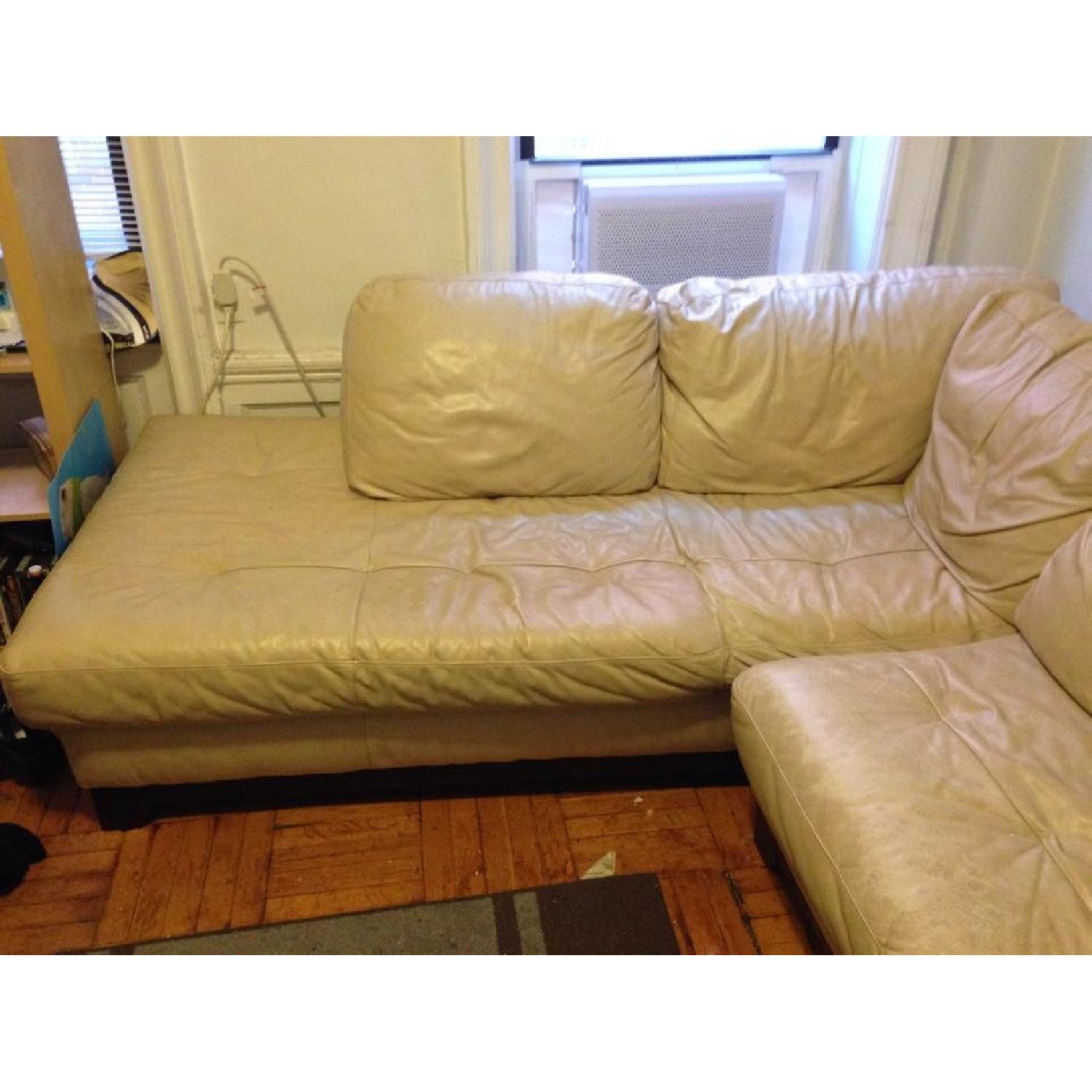 Haverty's White Leather Sectional AptDeco