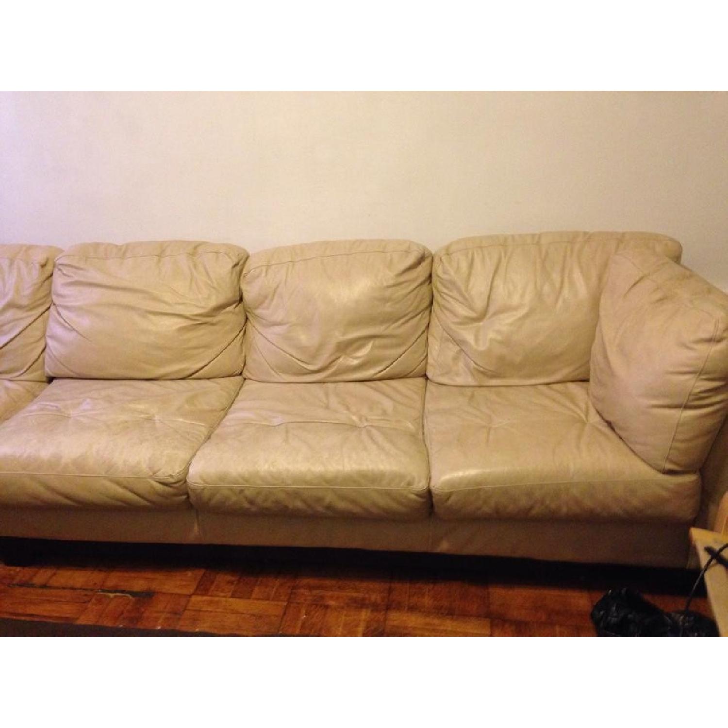 Haverty's White Leather Sectional AptDeco