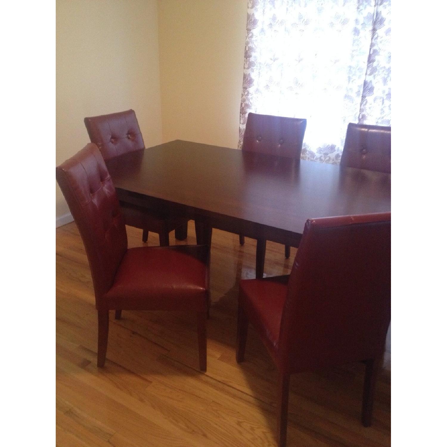 Pier 1 Dining Table and 6 Leather Chairs AptDeco