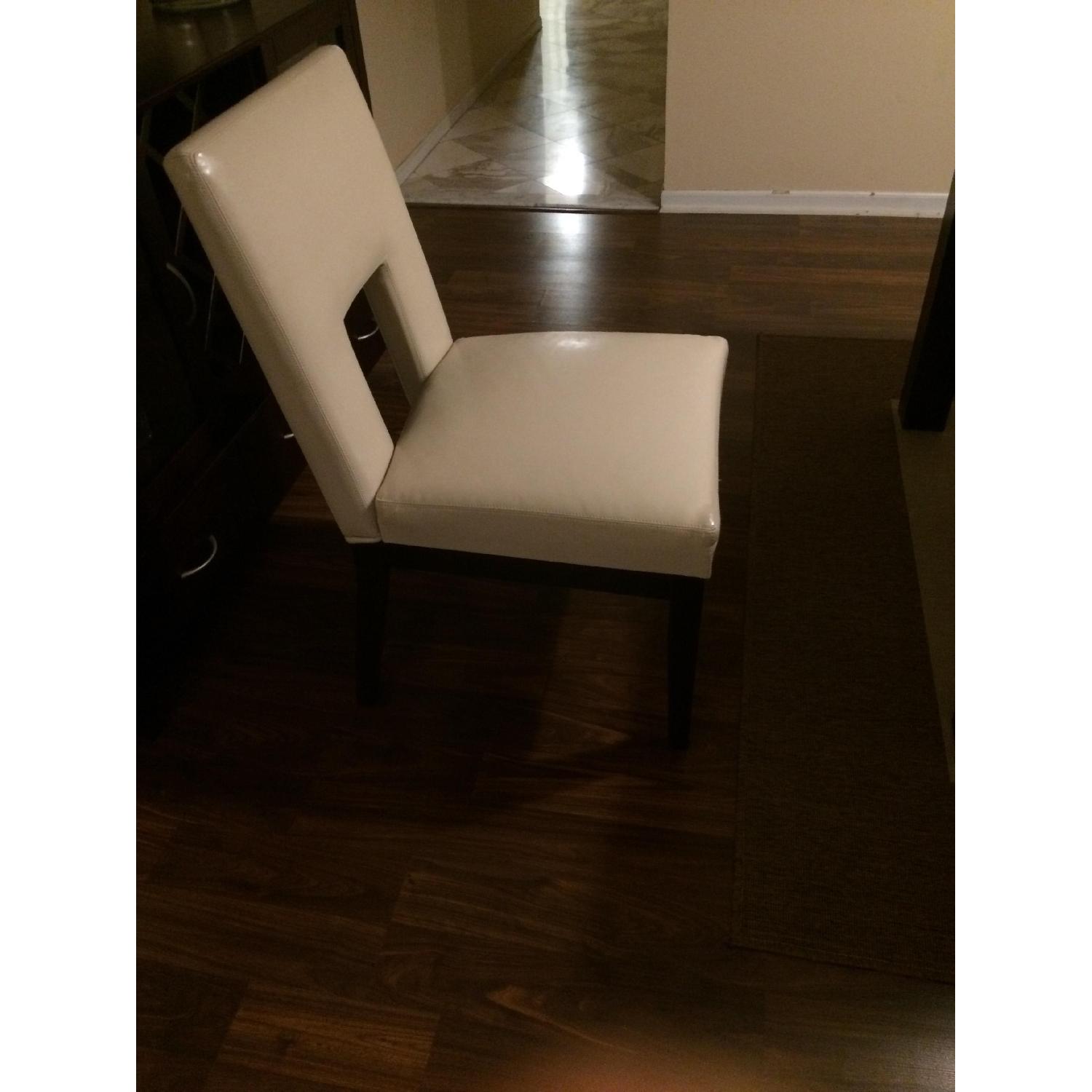 Pier 1 Ivory Faux Leather Dining Chairs AptDeco