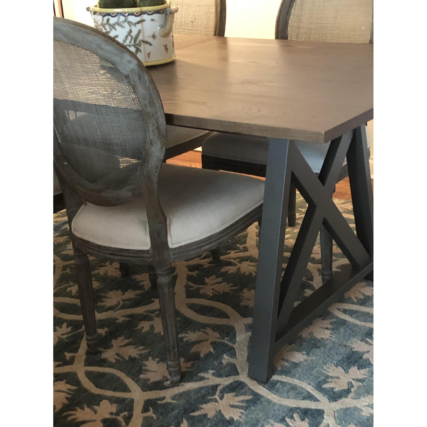 Crate & Barrel Expandable Dining Table AptDeco