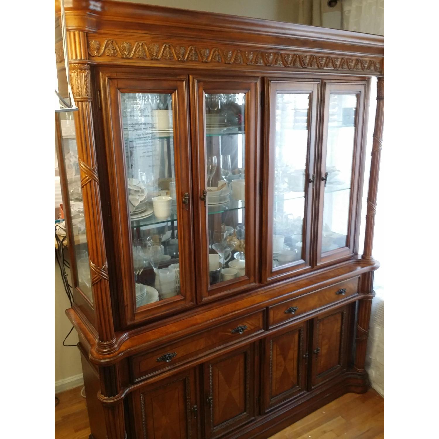 Raymour & Flanigan Lighted Solid Wood Glass China Cabinet - image-1