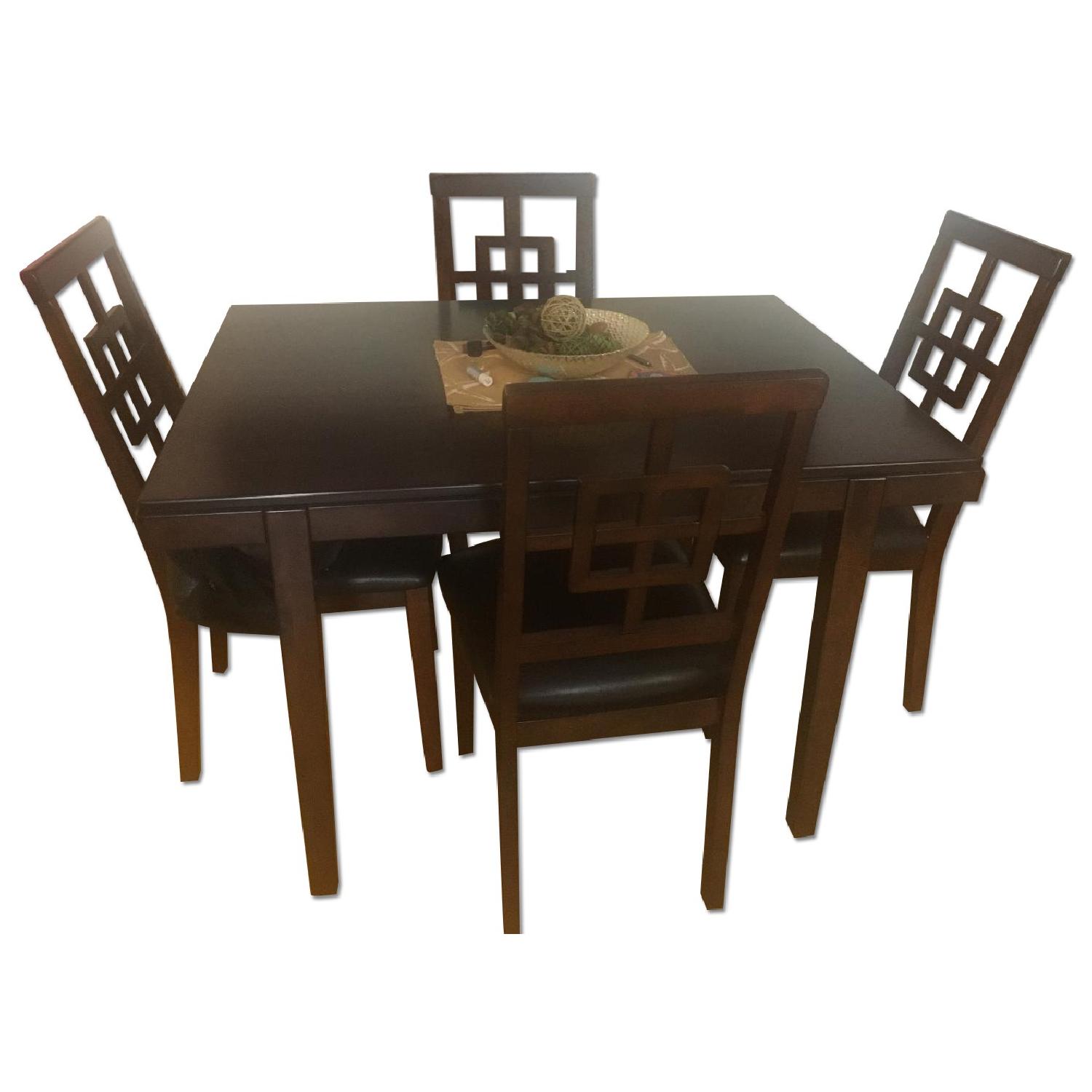 Jennifer Convertibles Cherry Wood Dining Table w/ 4 Chairs - AptDeco