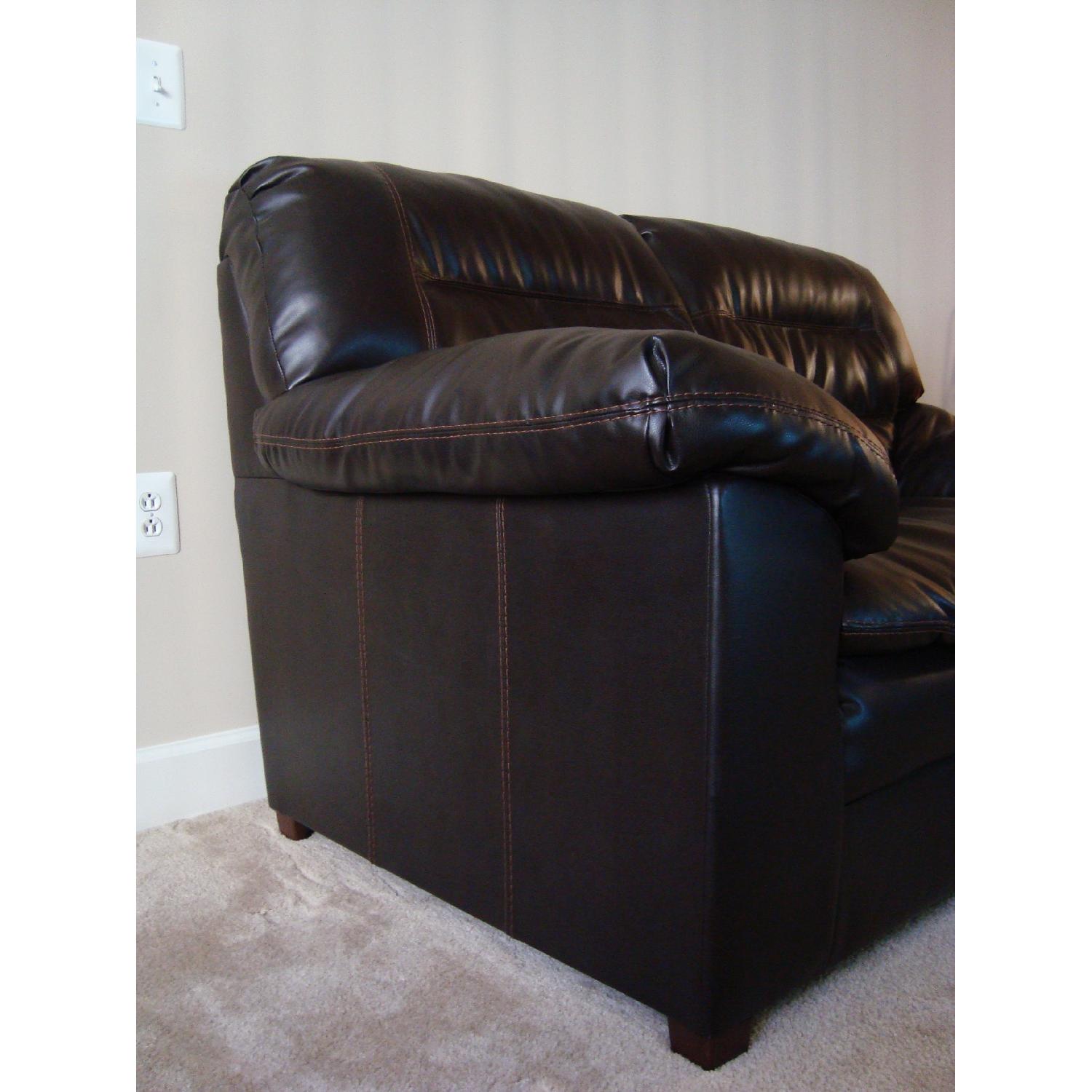 Ashley's Dark Brown Faux Leather Durablend Loveseat - image-2
