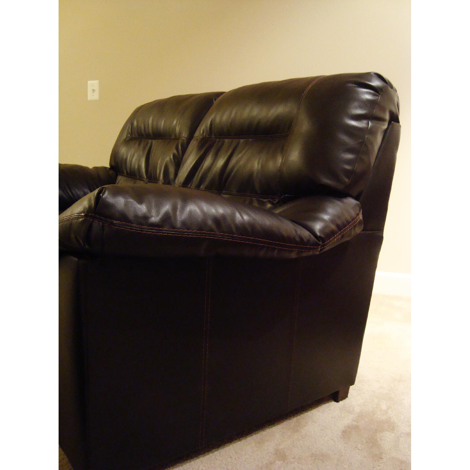 Ashley's Dark Brown Faux Leather Durablend Loveseat - image-3