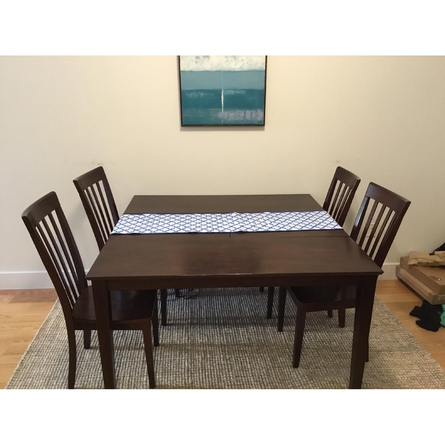 Dark Wood Table w/ 4 Matching Chairs - AptDeco