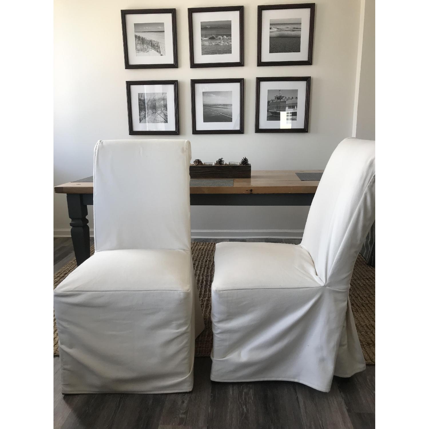 Pottery Barn White Slipcovered Dining Chairs - image-1