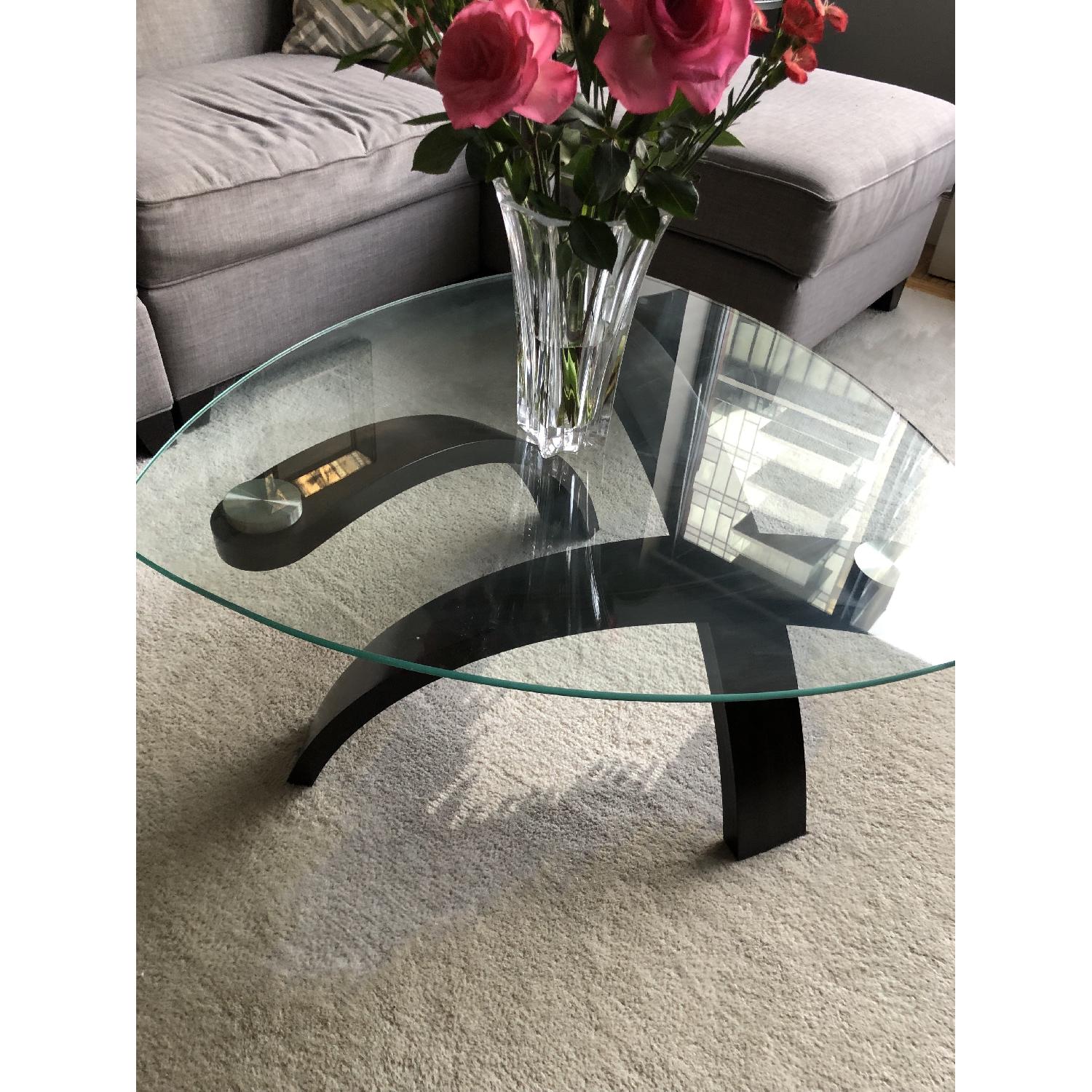 Raymour & Flanigan Glass & Wood Round Coffee Table AptDeco