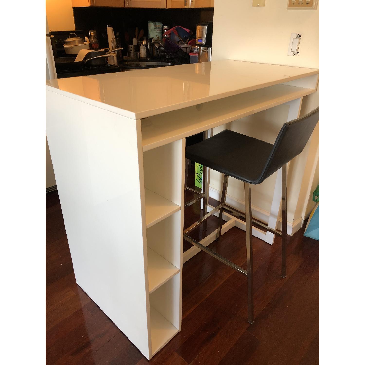 CB2 Public White High Dining Table w/ 2 Phoenix Bar Stools AptDeco