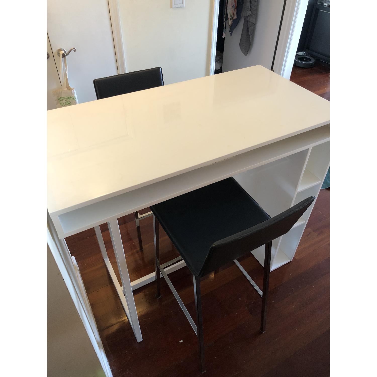 CB2 Public White High Dining Table w/ 2 Phoenix Bar Stools AptDeco