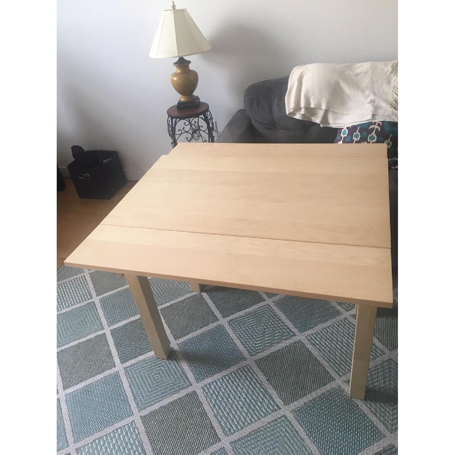 Ikea Bjursta Dining Table w/ Extension Flaps - AptDeco