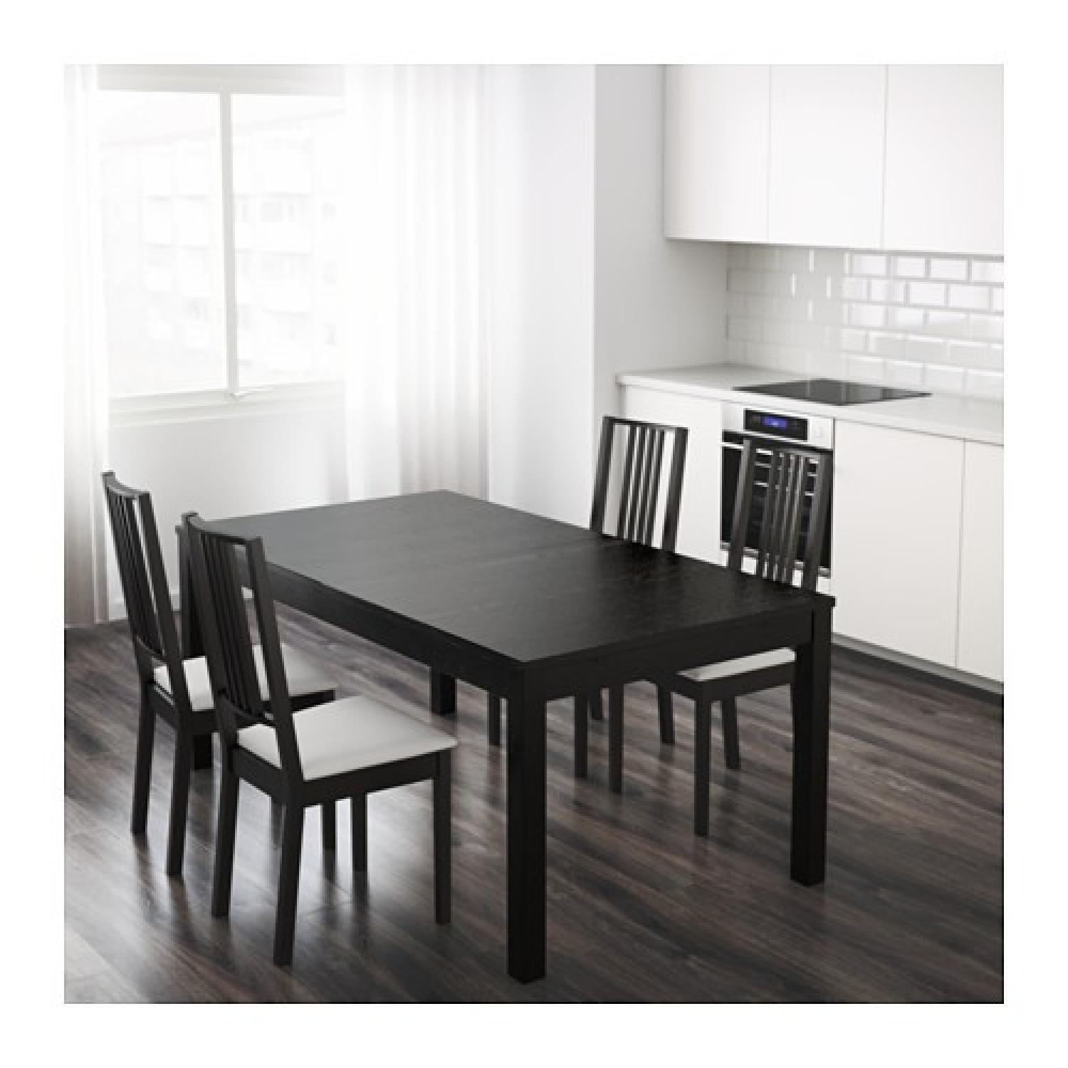 Ikea Bjursta Extendable Table in Brown/Black - AptDeco