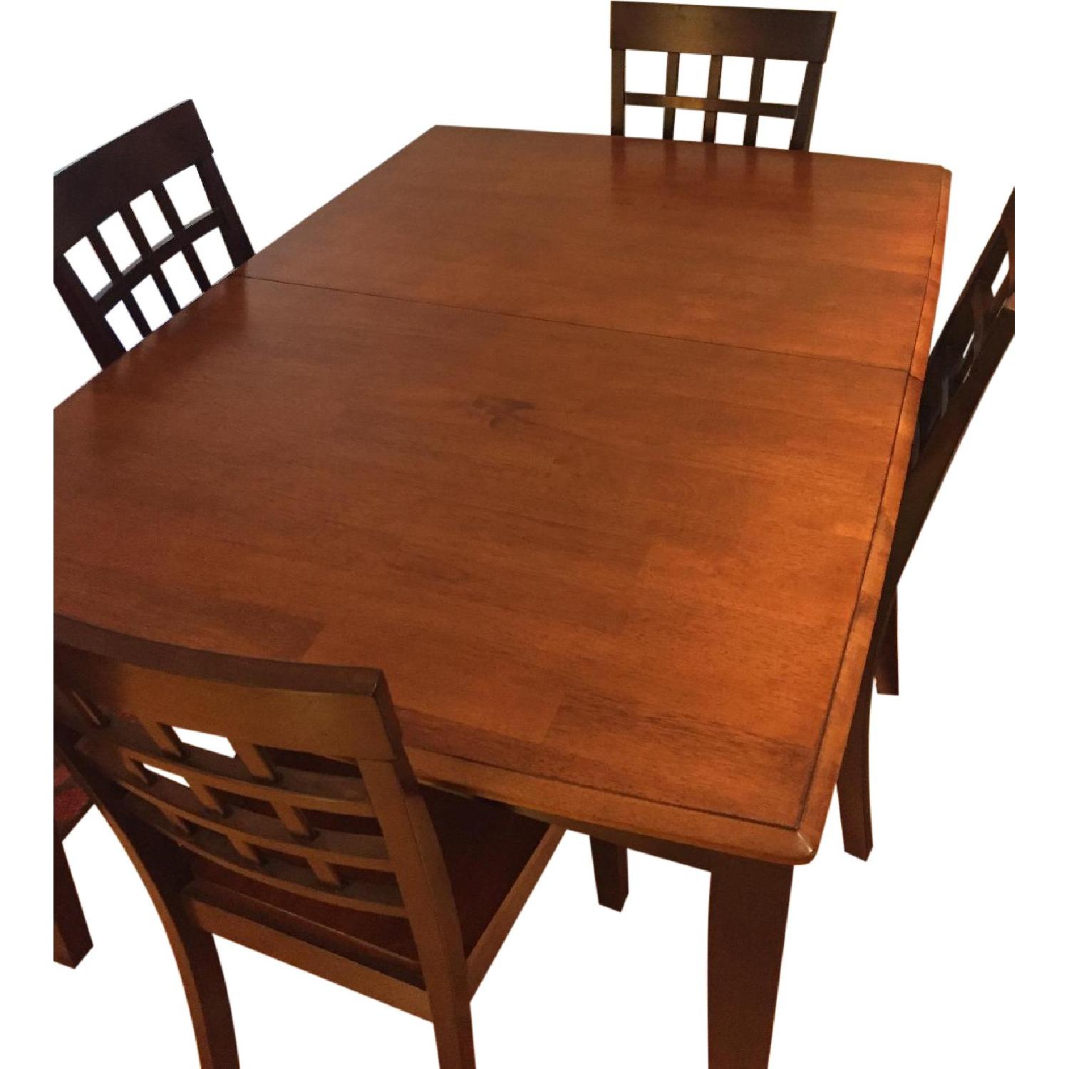 Solid Wood Table w/ Butterfly Leaf & 4 Matching Chairs - AptDeco