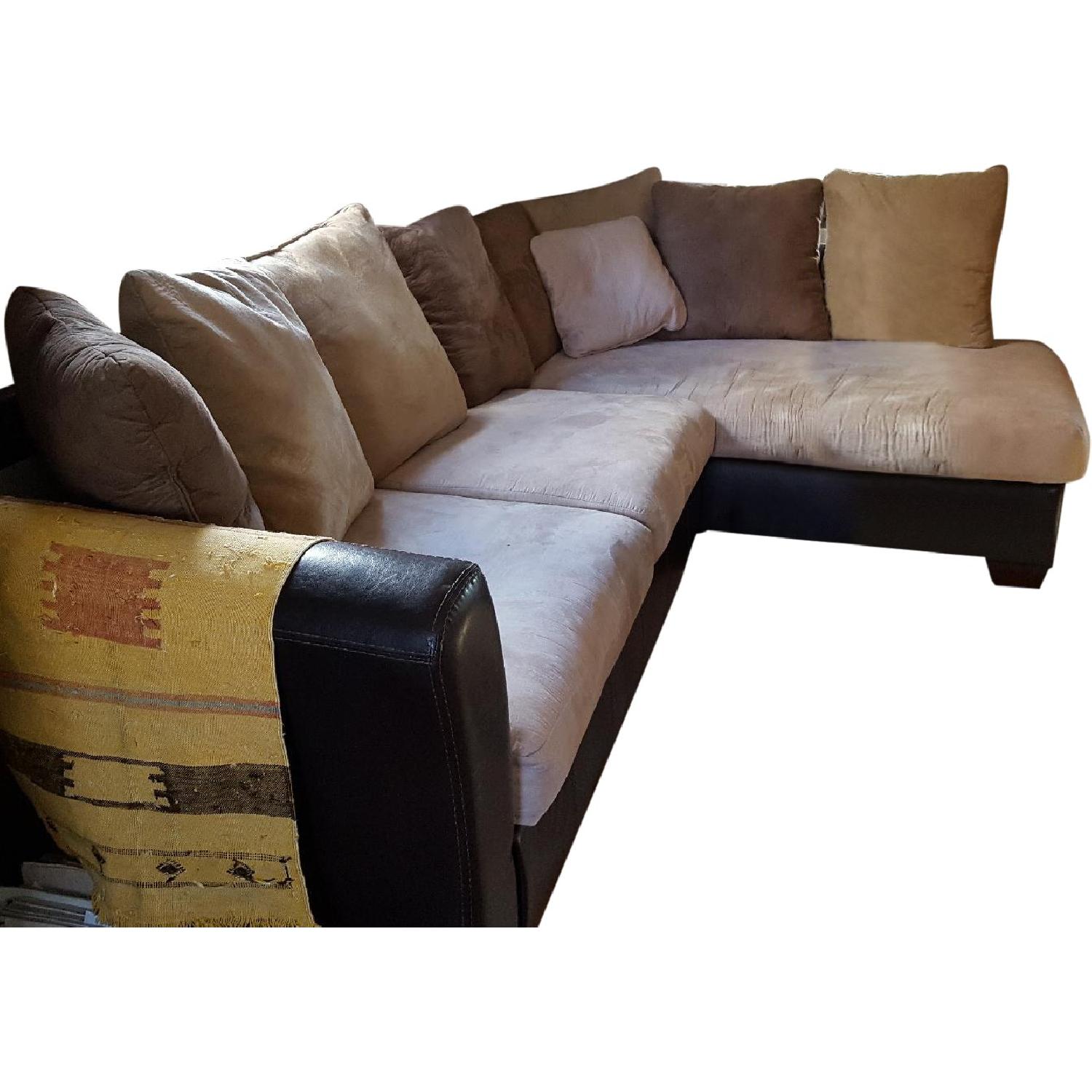 Ashley's Leather & Cream Sectional - image-0