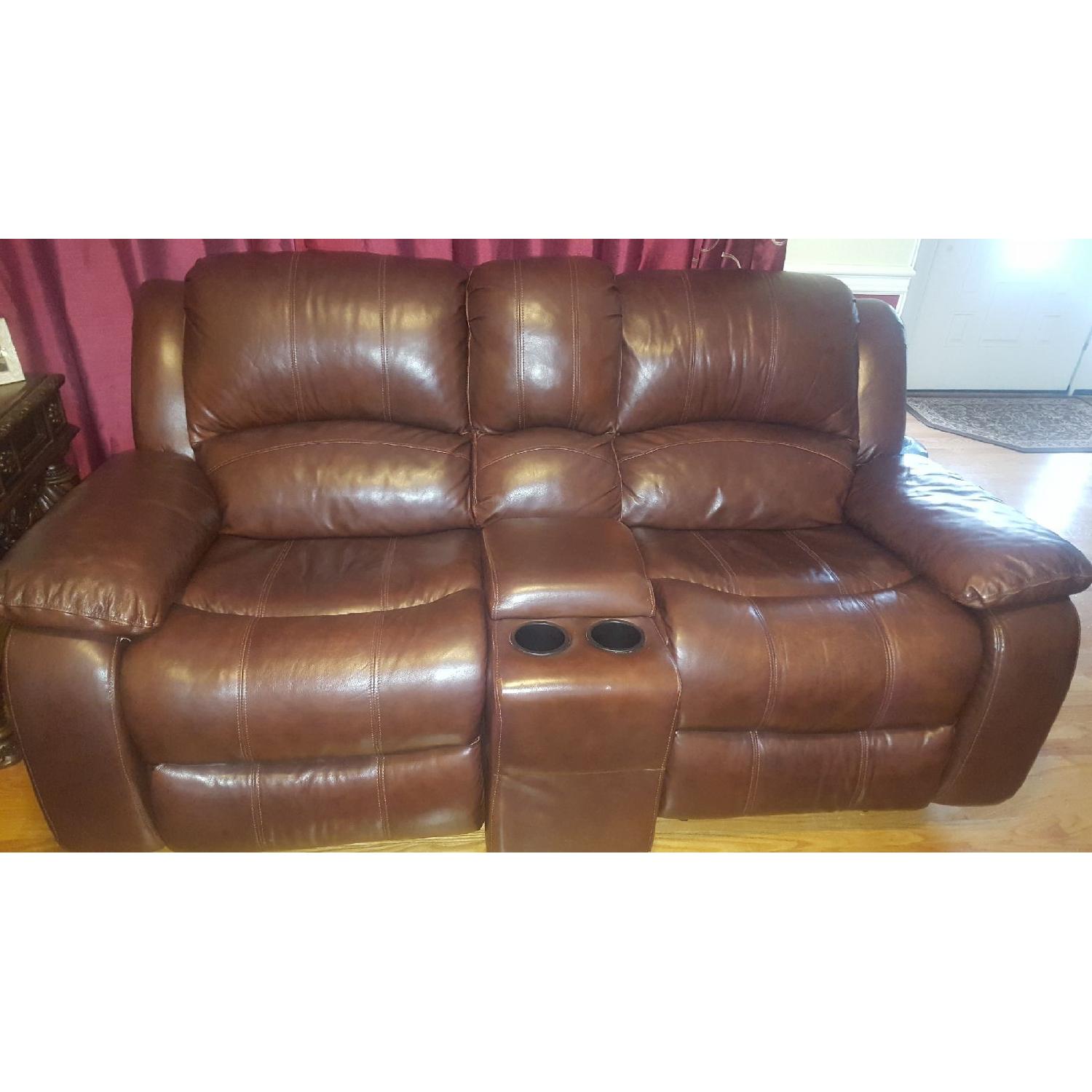Raymour & Flanigan Bryant II Leather Reclining Sofa AptDeco