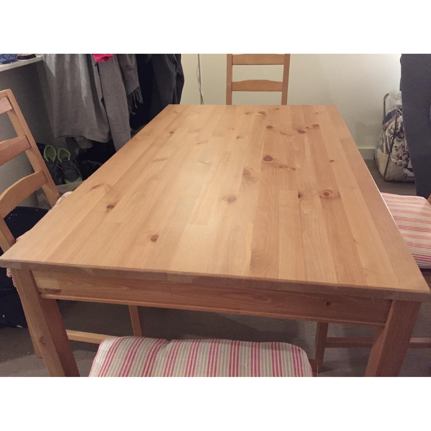 Ikea Pine Wood Table w/ 4 Cushioned Chairs AptDeco