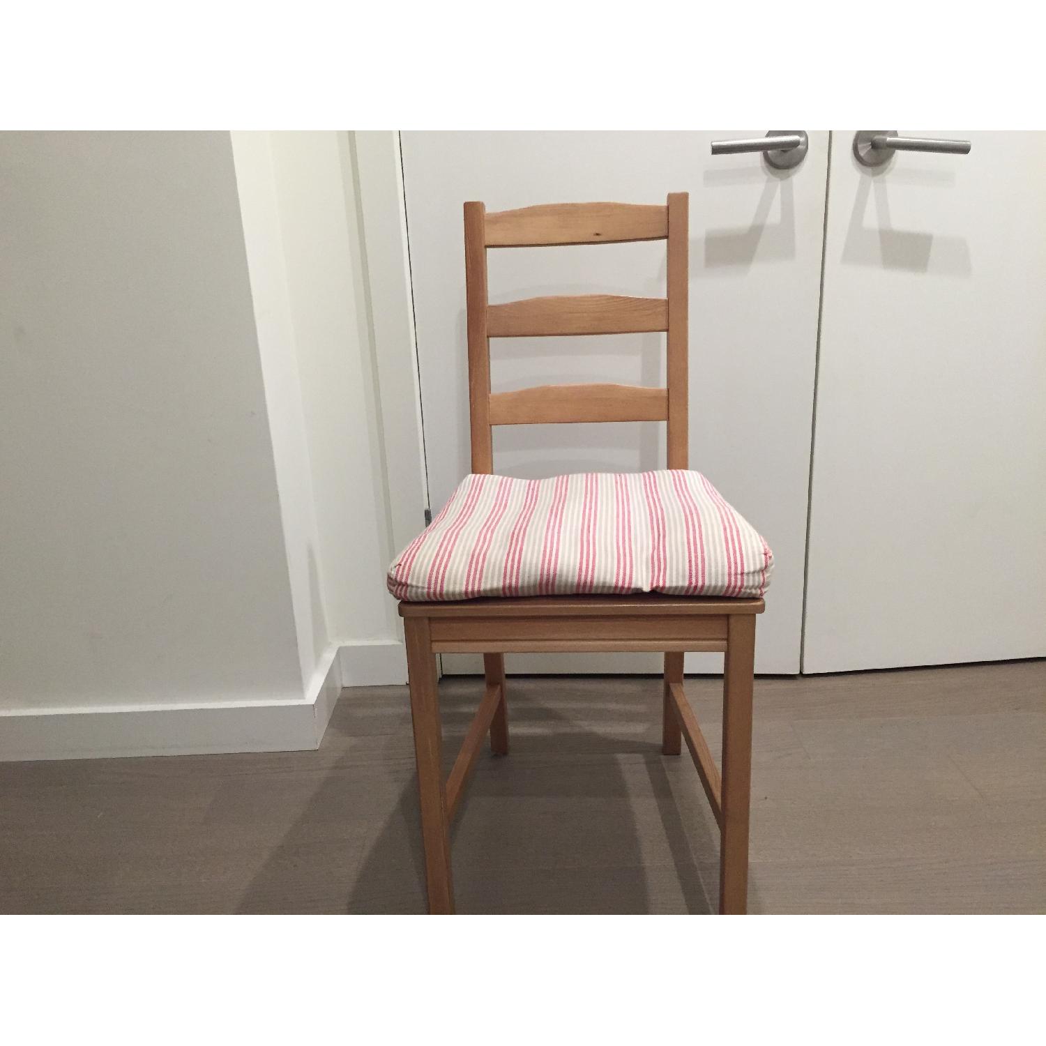 Ikea Pine Wood Table w/ 4 Cushioned Chairs AptDeco