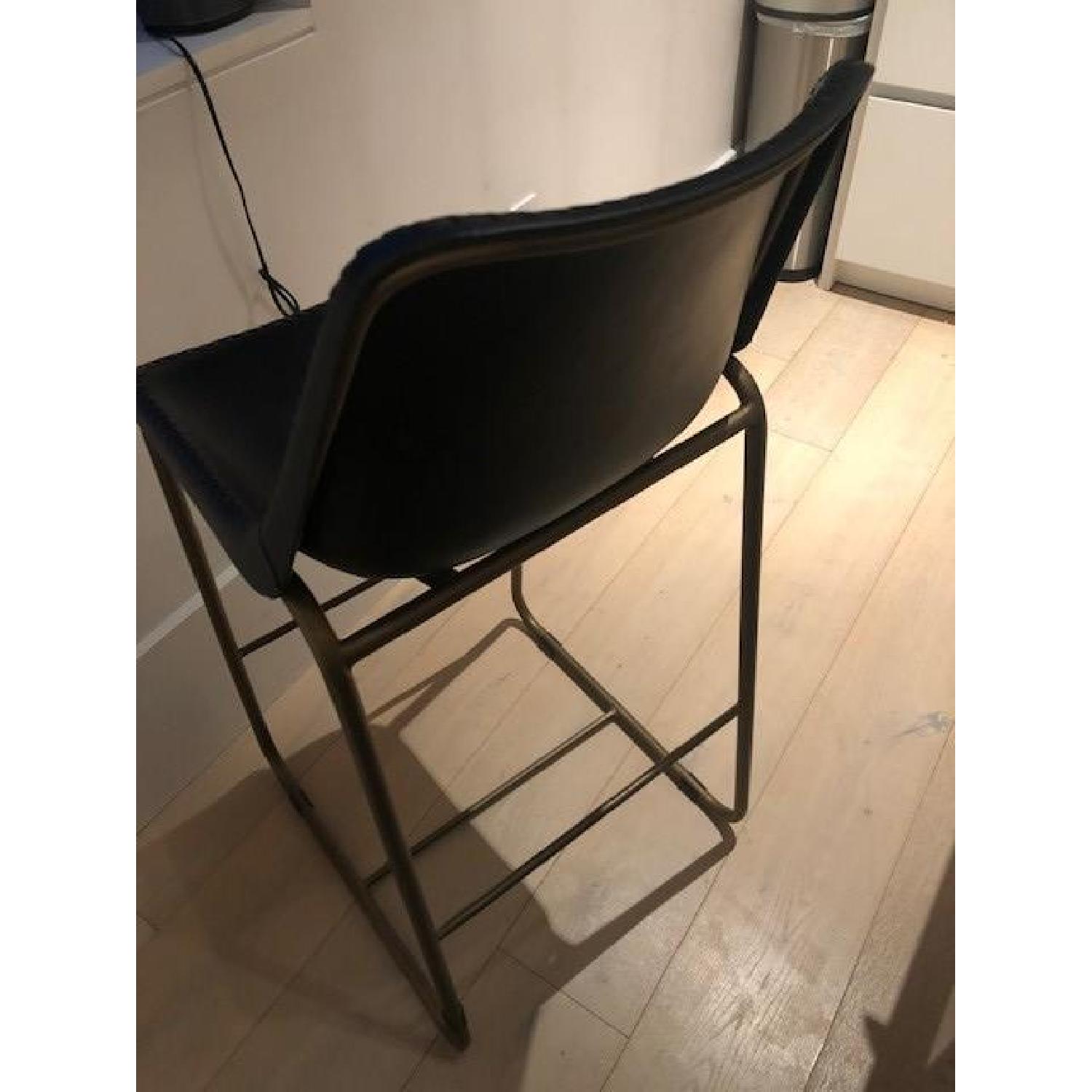 CB2 Roadhouse Black Leather Bar Stool - image-3