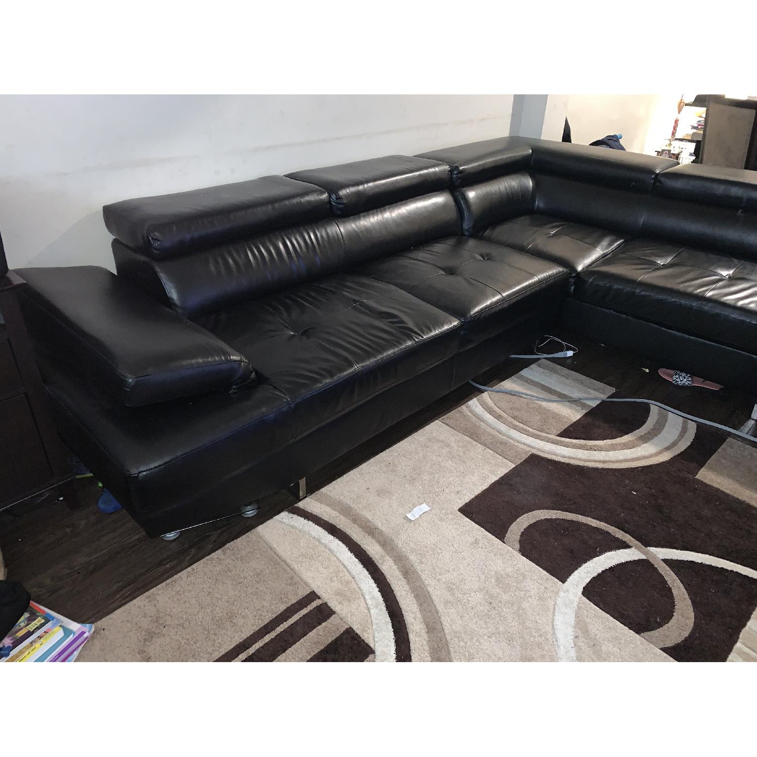 Bob's Black Leather Sectional Sofa - image-1