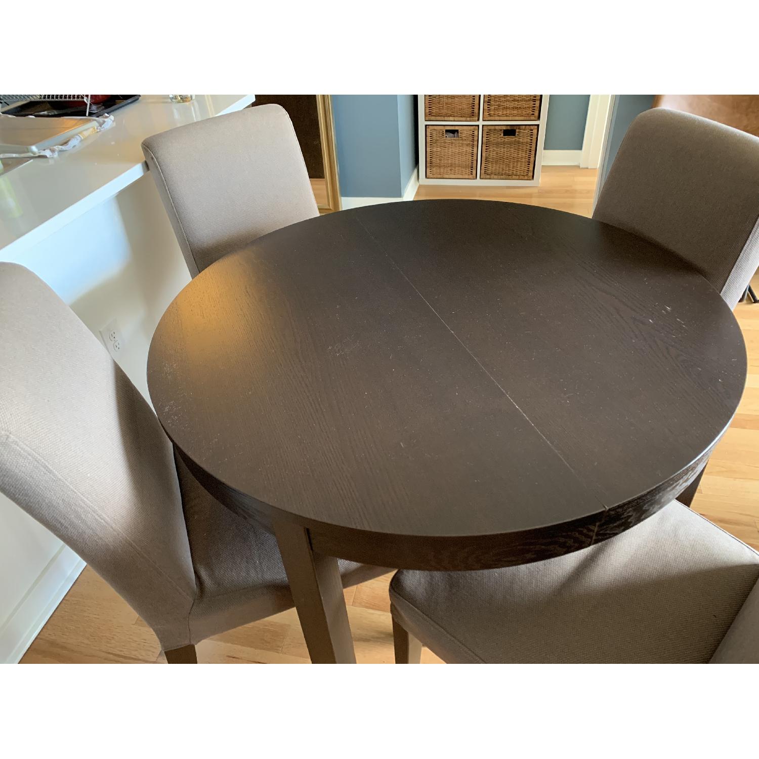 Ikea Bjursta Round Extendable Table w/ 4 Henriksdal Chairs - AptDeco
