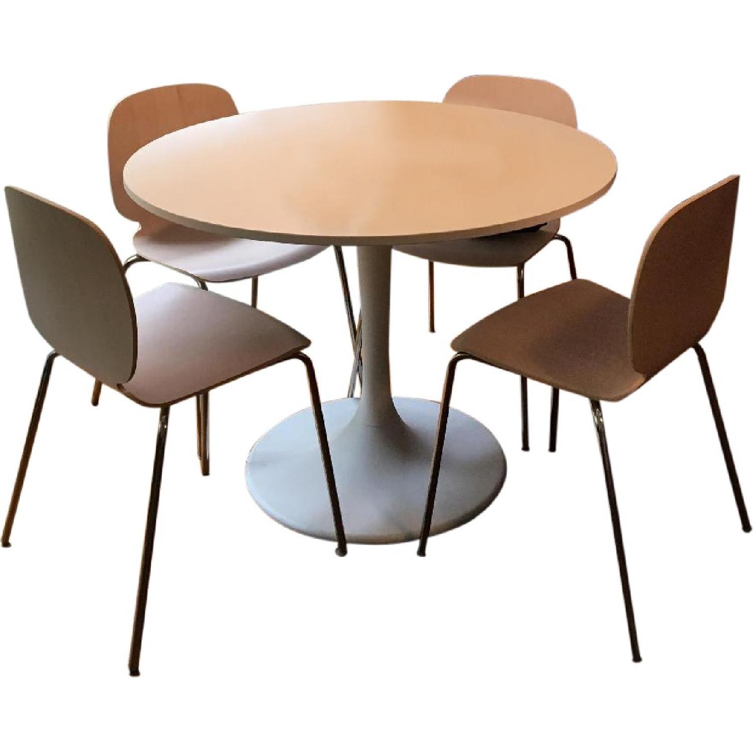 Ikea White Pedestal Table w/ 4 Natural Wood Chairs - image-0