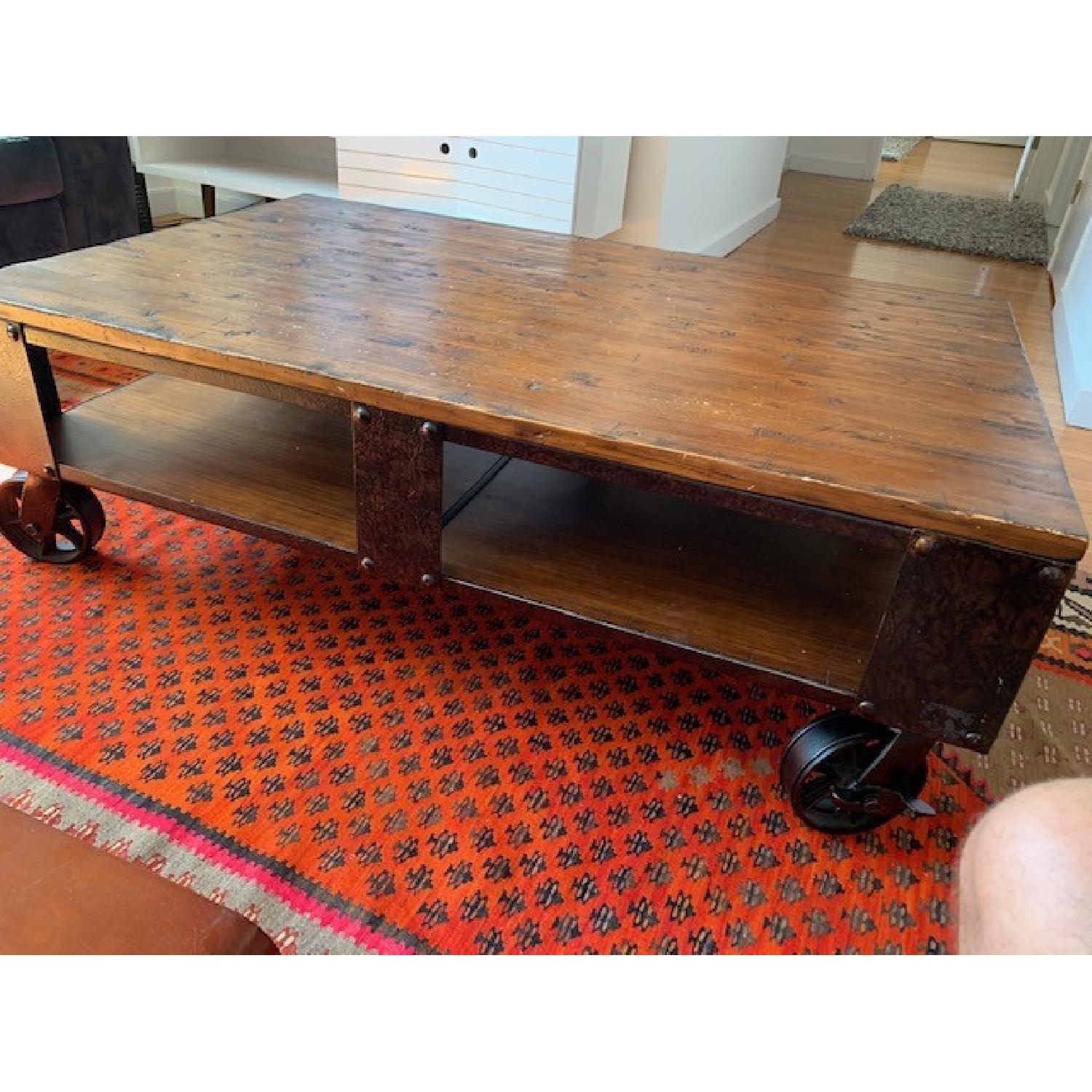 Ashley Industrial Style Coffee Table on Wheels - image-1