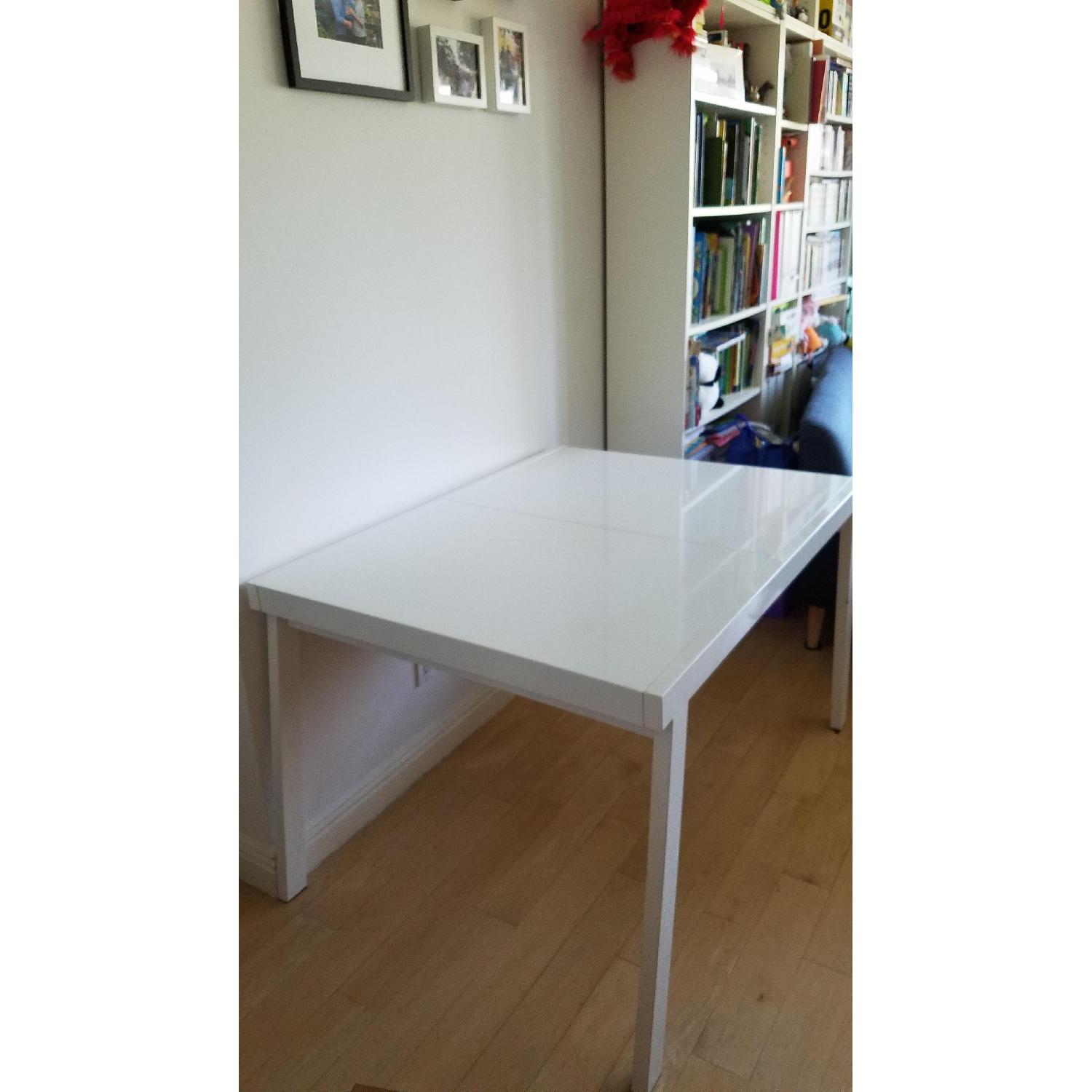 CB2 Pocket White Extendable Dining Table - image-1