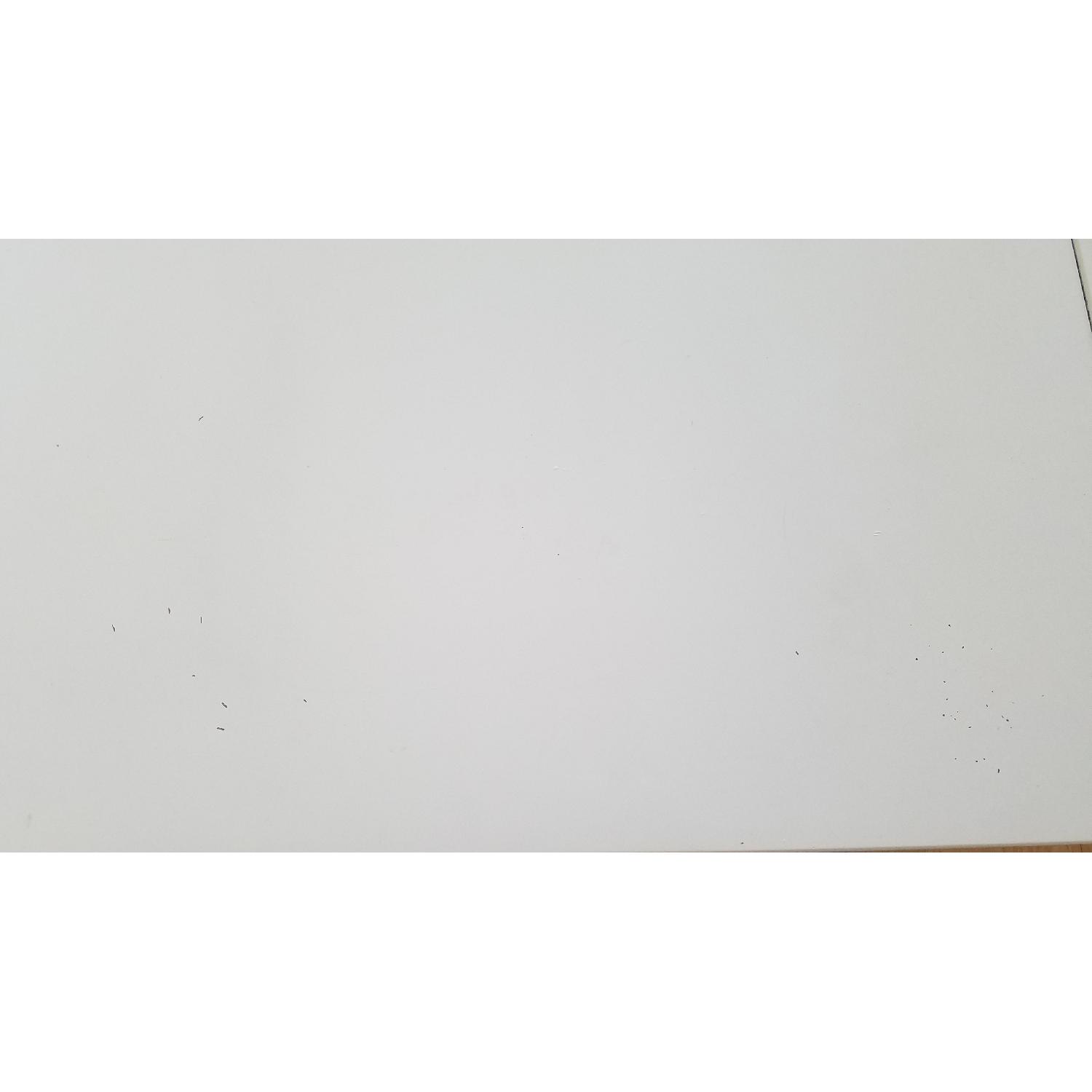 CB2 Pocket White Extendable Dining Table - image-3