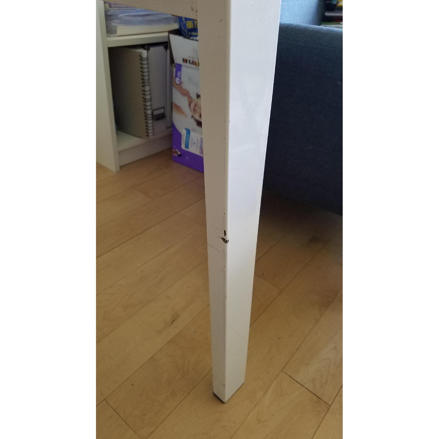 CB2 Pocket White Extendable Dining Table - image-4
