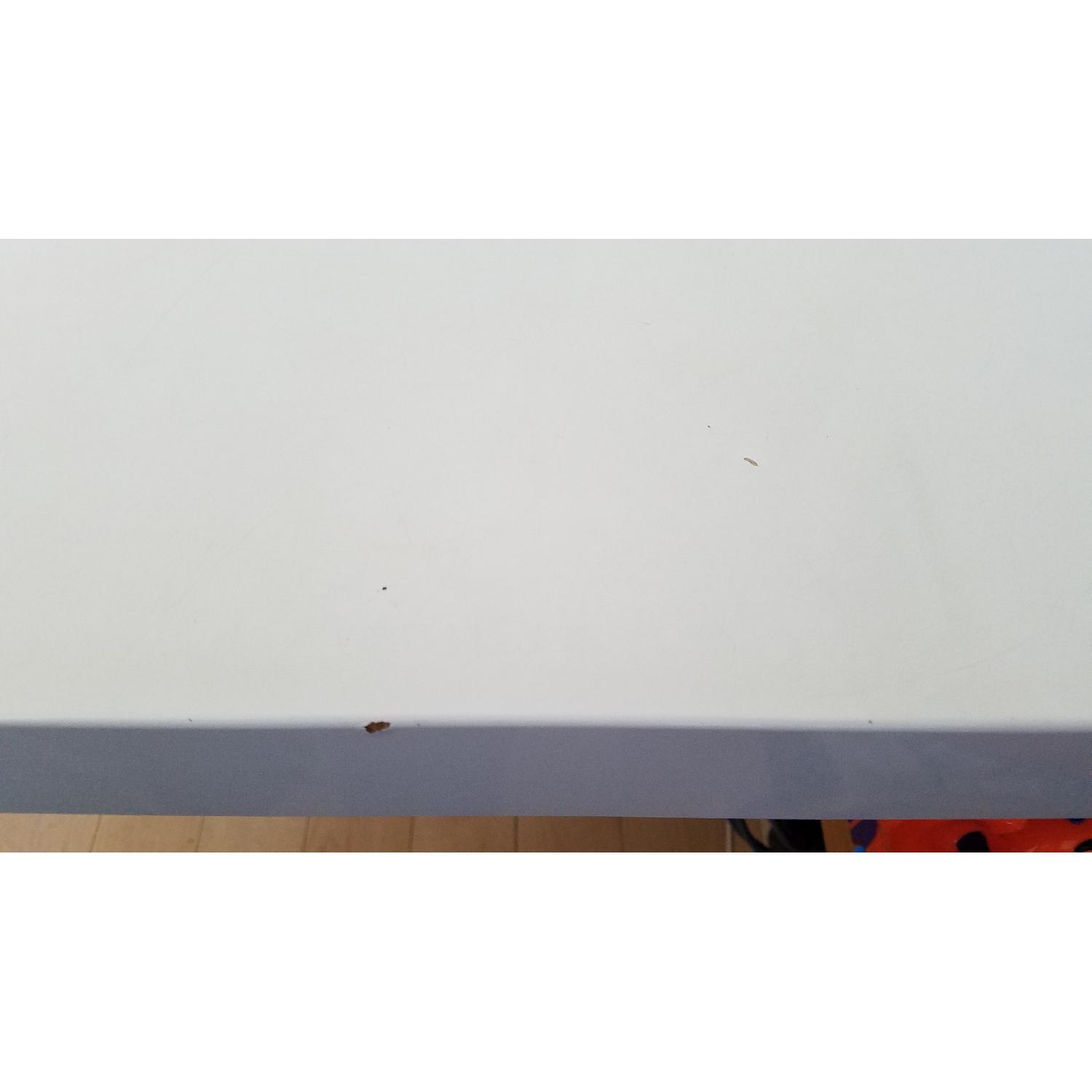 CB2 Pocket White Extendable Dining Table - image-5