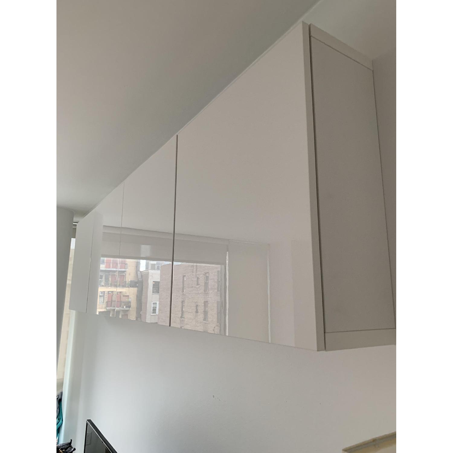 Ikea Wall Shelves w/ Doors AptDeco