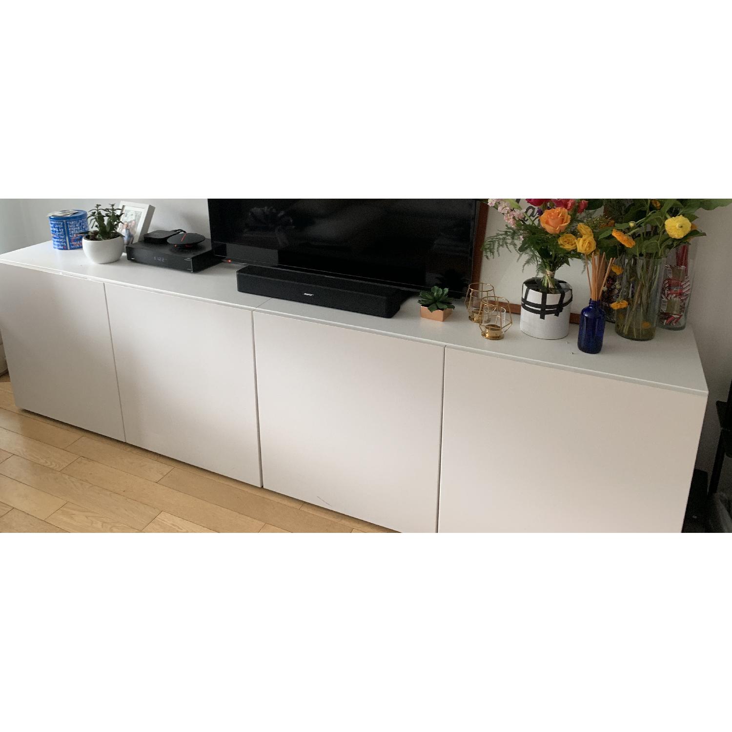 Ikea Besta Double w/ Shelves & Doors AptDeco