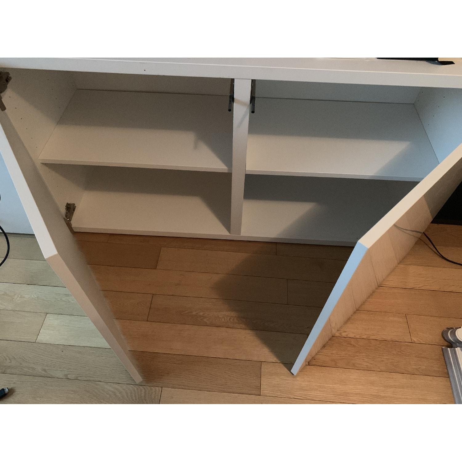 Ikea Besta Double w/ Shelves & Doors AptDeco